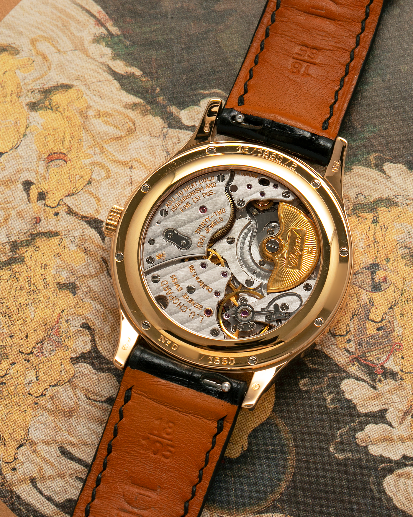 Brand: Chopard L.U.C.
Year: 1990’s
Model: 16/1860/2
Material: 18-carat Rose Gold
Movement: Chopard Cal. 1.96, Self-Winding Micro-Rotor
Case Diameter: 37mm x 8.5mm (Lug-to-Lug 45mm)
Lug Width: 18mm
Strap: Delugs Black Alligator Leather Strap with signed 18-carat Rose Gold Tang Buckle, extra Chopard Black Alligator Leather Strap
