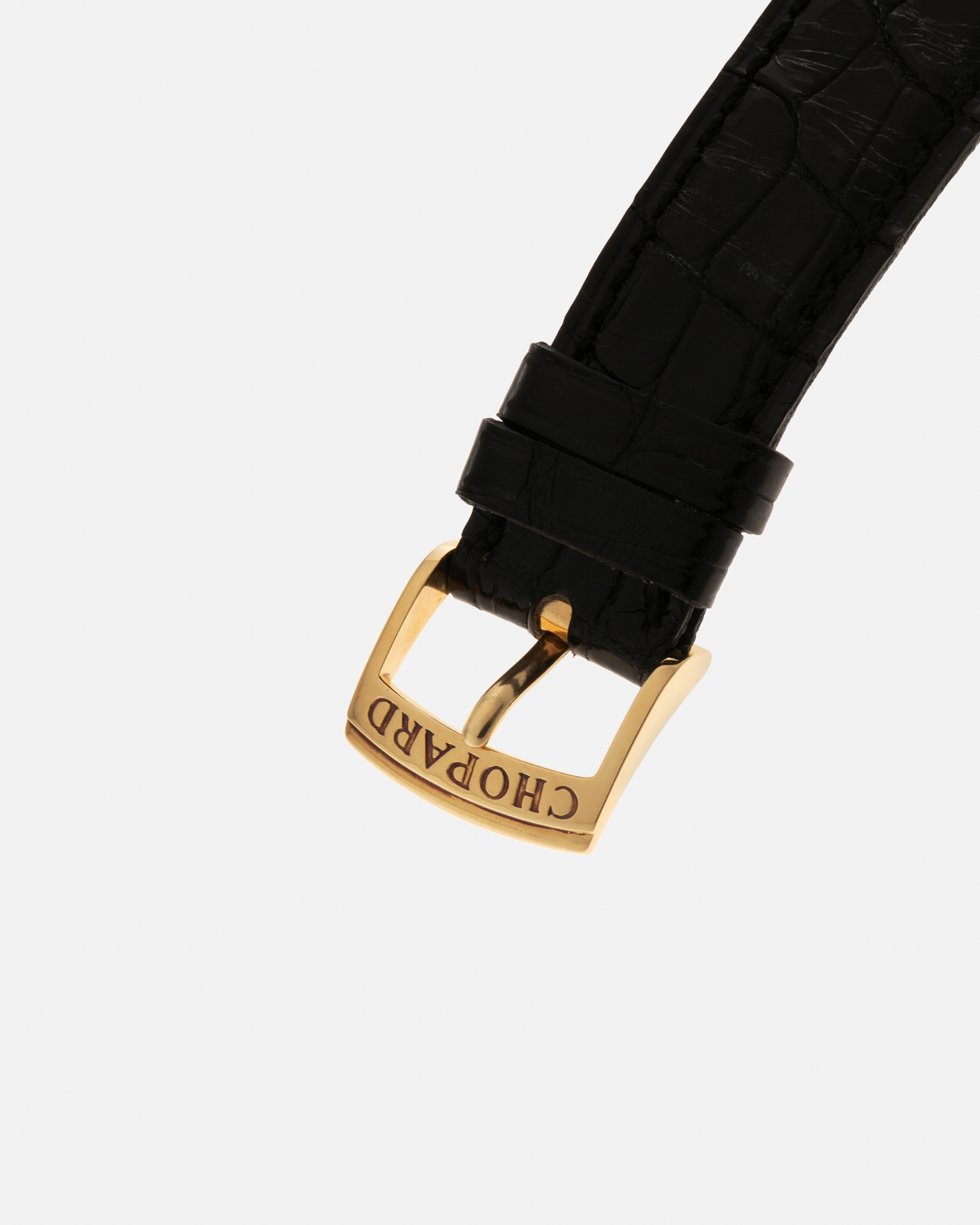 Brand: Chopard L.U.C. Year: 1990s Model: 16/1860/2 ‘Prototype No-Date Black Dial’ Material: 18-carat Yellow Gold Movement: Chopard Cal. 1.96, Self-Winding Micro-Rotor Case Diameter: 37mm Lug Width: 18mm Strap: Chopard Black Alligator Leather Strap with Signed 18-carat Yellow Gold Tang Buckle
