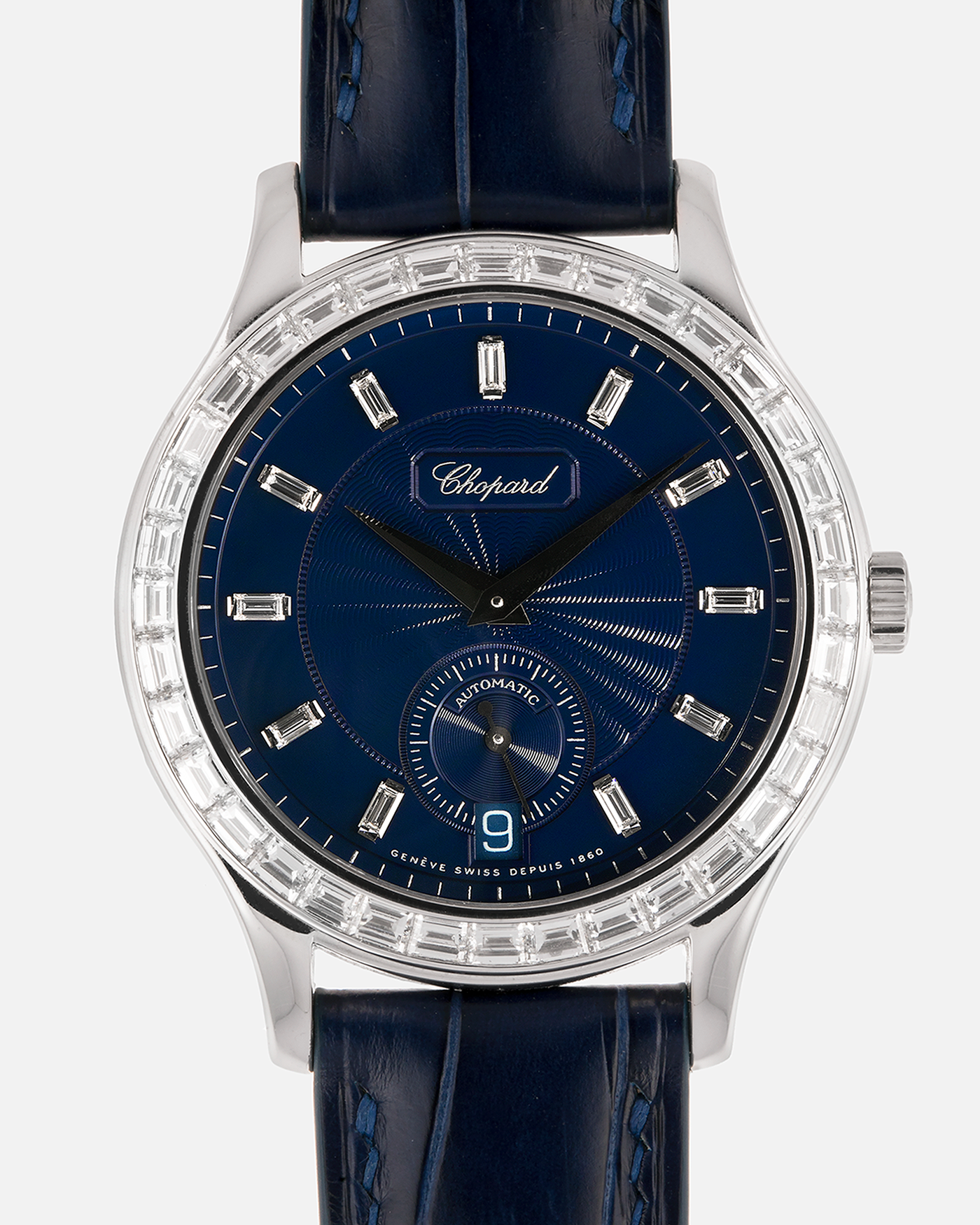 Brand: Chopard L.U.C.
Year: 2000’s
Model: 16/1864/2 Based Off 16/1860/2
Material: 18-carat White Gold Case, Factory-Set Baguette Diamond Bezel and Dial
Movement: Chopard Cal. 1.96, Self-Winding Micro-Rotor
Case Dimensions: 37mm Diameter 8.5mm Thickness
Lug Width: 18mm
Strap: Custom Order Blue Alligator Leather Strap with 18k White Gold Chopard Tang Buckle