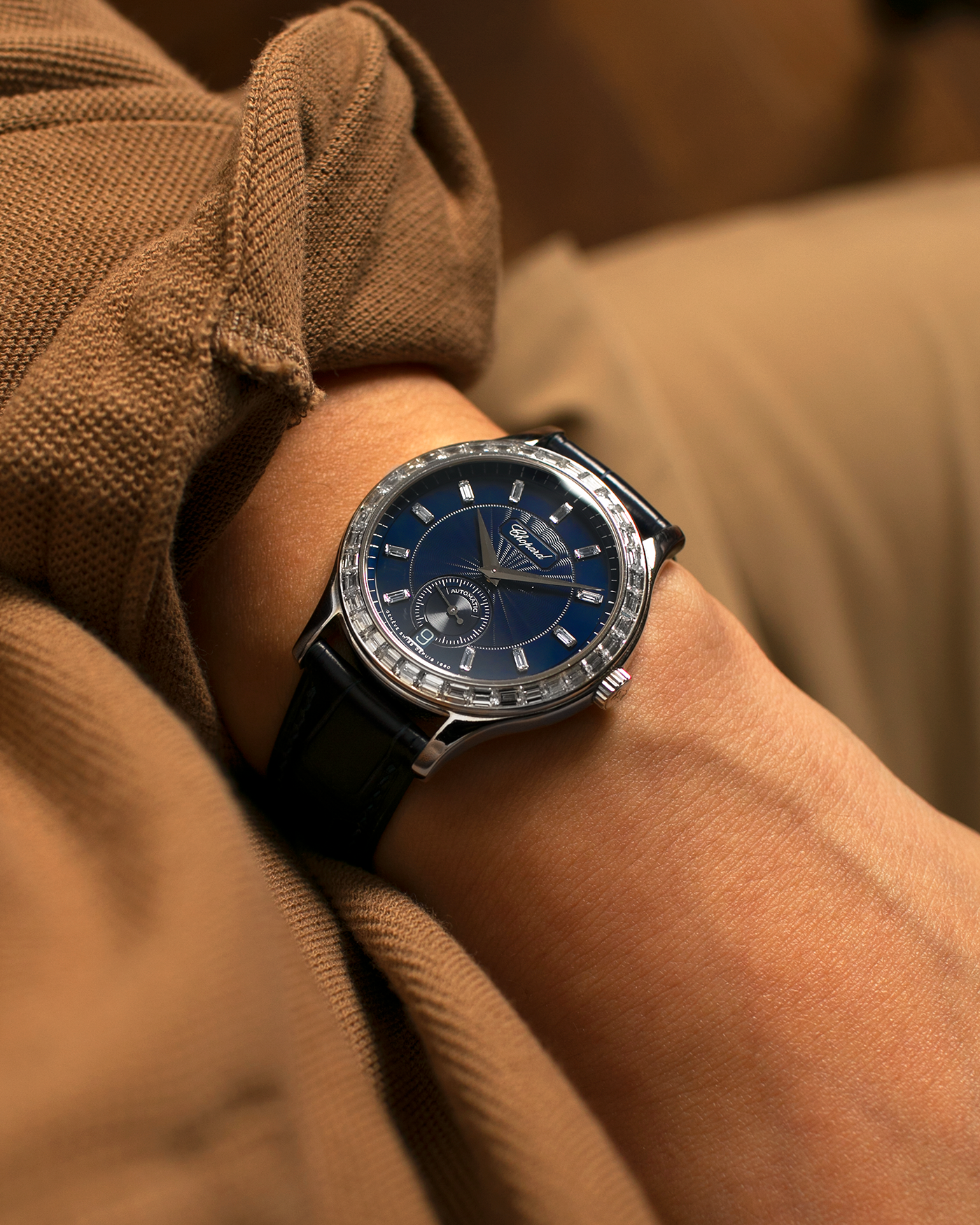 Brand: Chopard L.U.C.
Year: 2000’s
Model: 16/1864/2 Based Off 16/1860/2
Material: 18-carat White Gold Case, Factory-Set Baguette Diamond Bezel and Dial
Movement: Chopard Cal. 1.96, Self-Winding Micro-Rotor
Case Dimensions: 37mm Diameter 8.5mm Thickness
Lug Width: 18mm
Strap: Custom Order Blue Alligator Leather Strap with 18k White Gold Chopard Tang Buckle