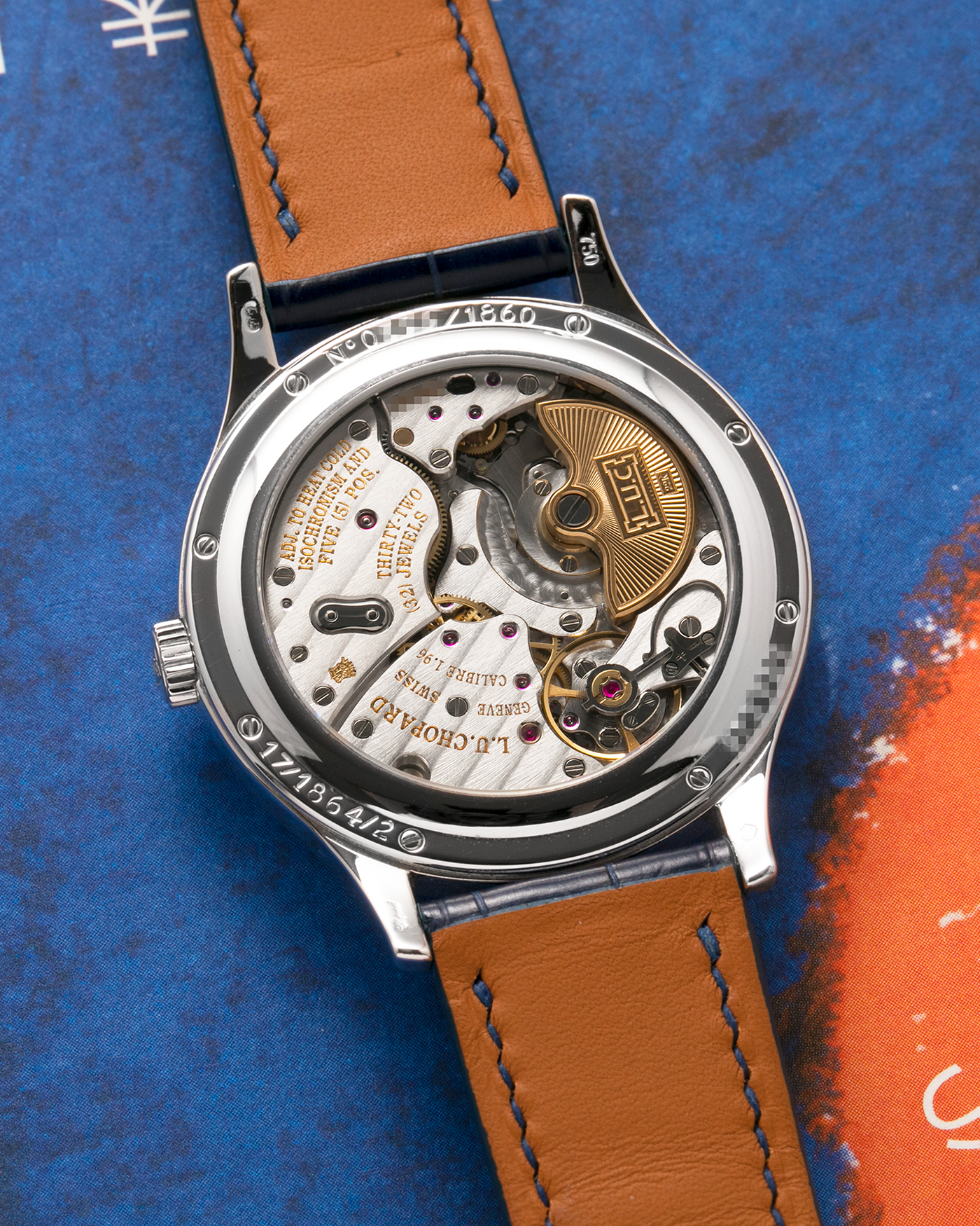 Brand: Chopard L.U.C.
Year: 2000’s
Model: 16/1864/2 Based Off 16/1860/2
Material: 18-carat White Gold Case, Factory-Set Baguette Diamond Bezel and Dial
Movement: Chopard Cal. 1.96, Self-Winding Micro-Rotor
Case Dimensions: 37mm Diameter 8.5mm Thickness
Lug Width: 18mm
Strap: Custom Order Blue Alligator Leather Strap with 18k White Gold Chopard Tang Buckle