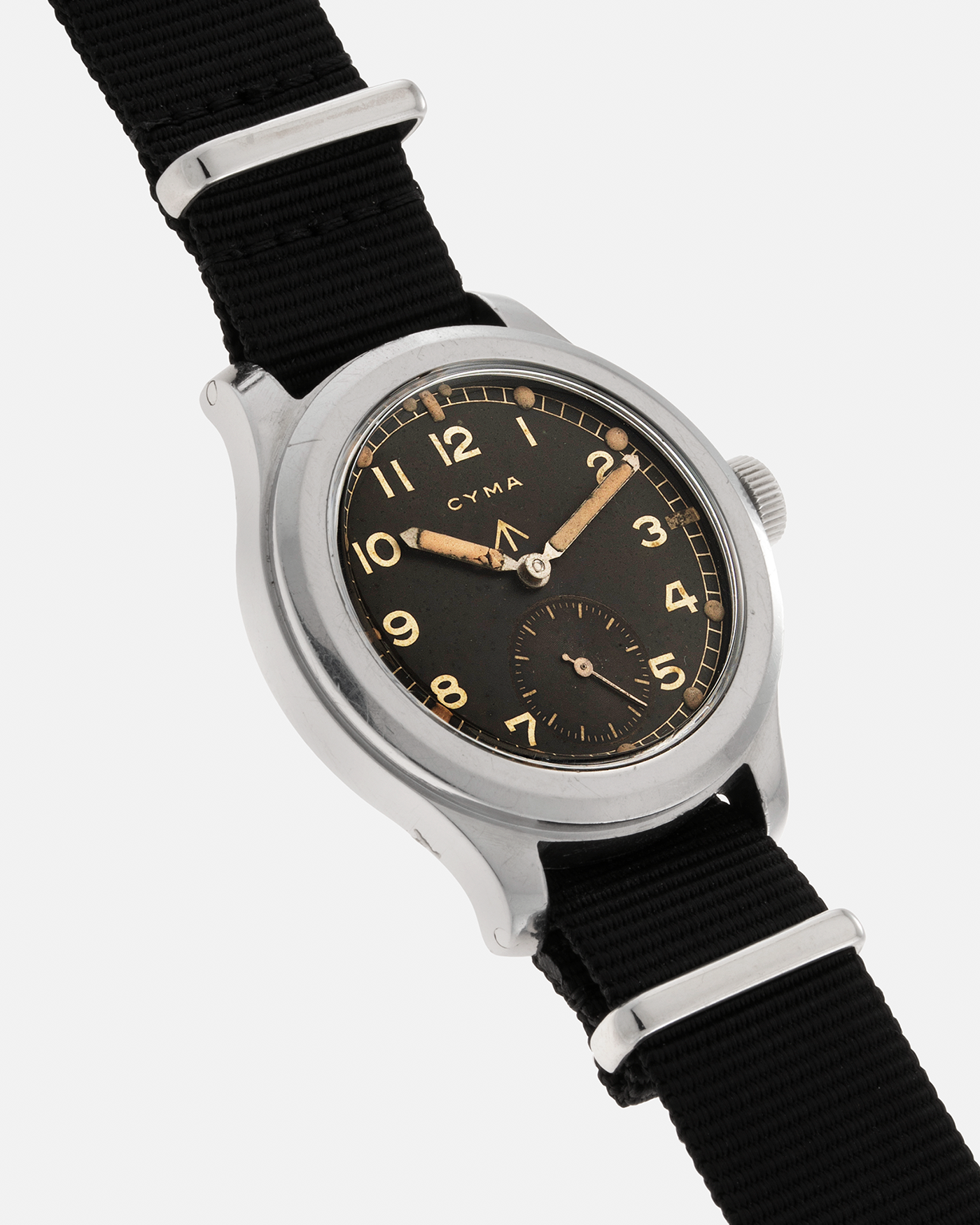 Brand: Cyma Year: 1940s Model: W.W.W. (Watch, Wristlet, Waterproof) Material: Stainless Steel Movement: Cyma Cal. 234, Manual-Winding Case Diameter: 38mm Lug Width: 18mm Strap: Generic Black Fabric NATO strap