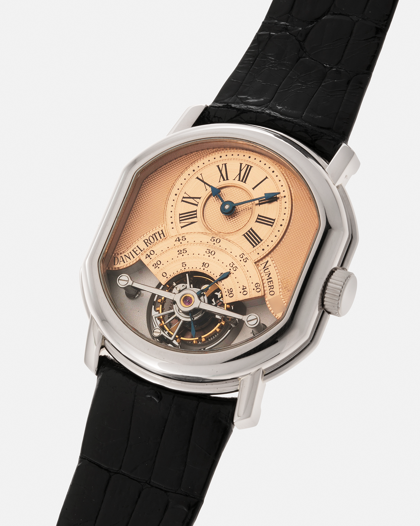 Brand: Daniel Roth Year: 1990’s Model: 2187 Tourbillon (Possibly Piece Unique) Material: 18-Carat White Gold  Movement: Cal. DR 307 One-Minute Tourbillon Regulator, Manual-Winding  Case Diameter: 35mm x 38mm Strap: Daniel Roth Black Alligator Leather with Signed 180carat White Gold Tang Buckle