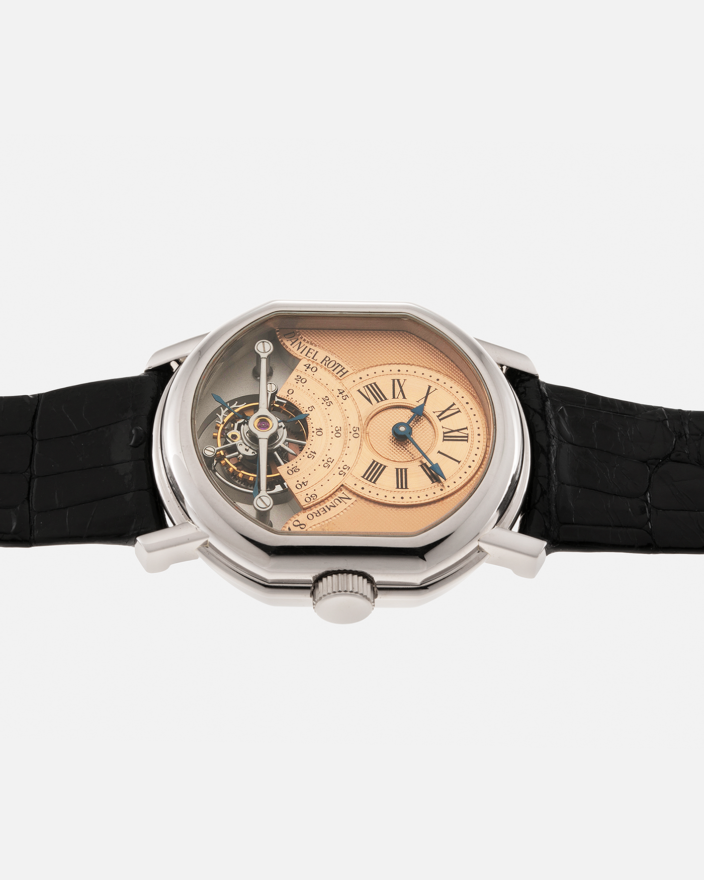 Brand: Daniel Roth Year: 1990’s Model: 2187 Tourbillon (Possibly Piece Unique) Material: 18-Carat White Gold  Movement: Cal. DR 307 One-Minute Tourbillon Regulator, Manual-Winding  Case Diameter: 35mm x 38mm Strap: Daniel Roth Black Alligator Leather with Signed 180carat White Gold Tang Buckle