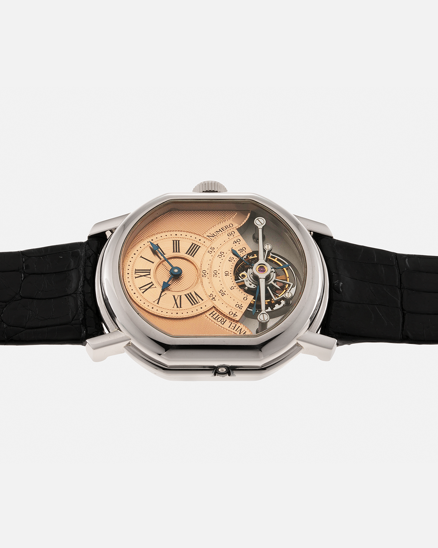 Brand: Daniel Roth Year: 1990’s Model: 2187 Tourbillon (Possibly Piece Unique) Material: 18-Carat White Gold  Movement: Cal. DR 307 One-Minute Tourbillon Regulator, Manual-Winding  Case Diameter: 35mm x 38mm Strap: Daniel Roth Black Alligator Leather with Signed 180carat White Gold Tang Buckle