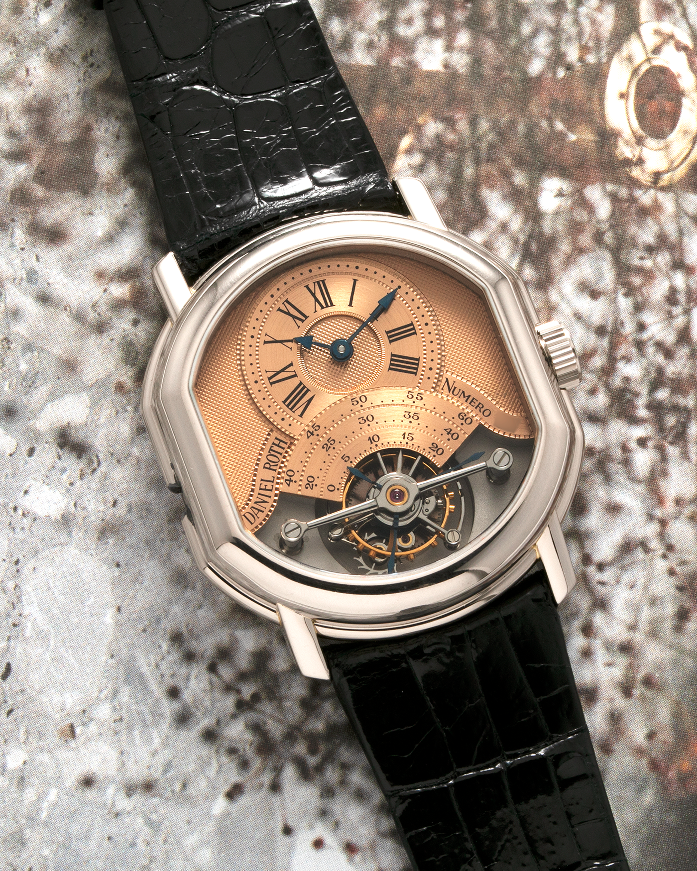 Brand: Daniel Roth Year: 1990’s Model: 2187 Tourbillon (Possibly Piece Unique) Material: 18-Carat White Gold  Movement: Cal. DR 307 One-Minute Tourbillon Regulator, Manual-Winding  Case Diameter: 35mm x 38mm Strap: Daniel Roth Black Alligator Leather with Signed 180carat White Gold Tang Buckle