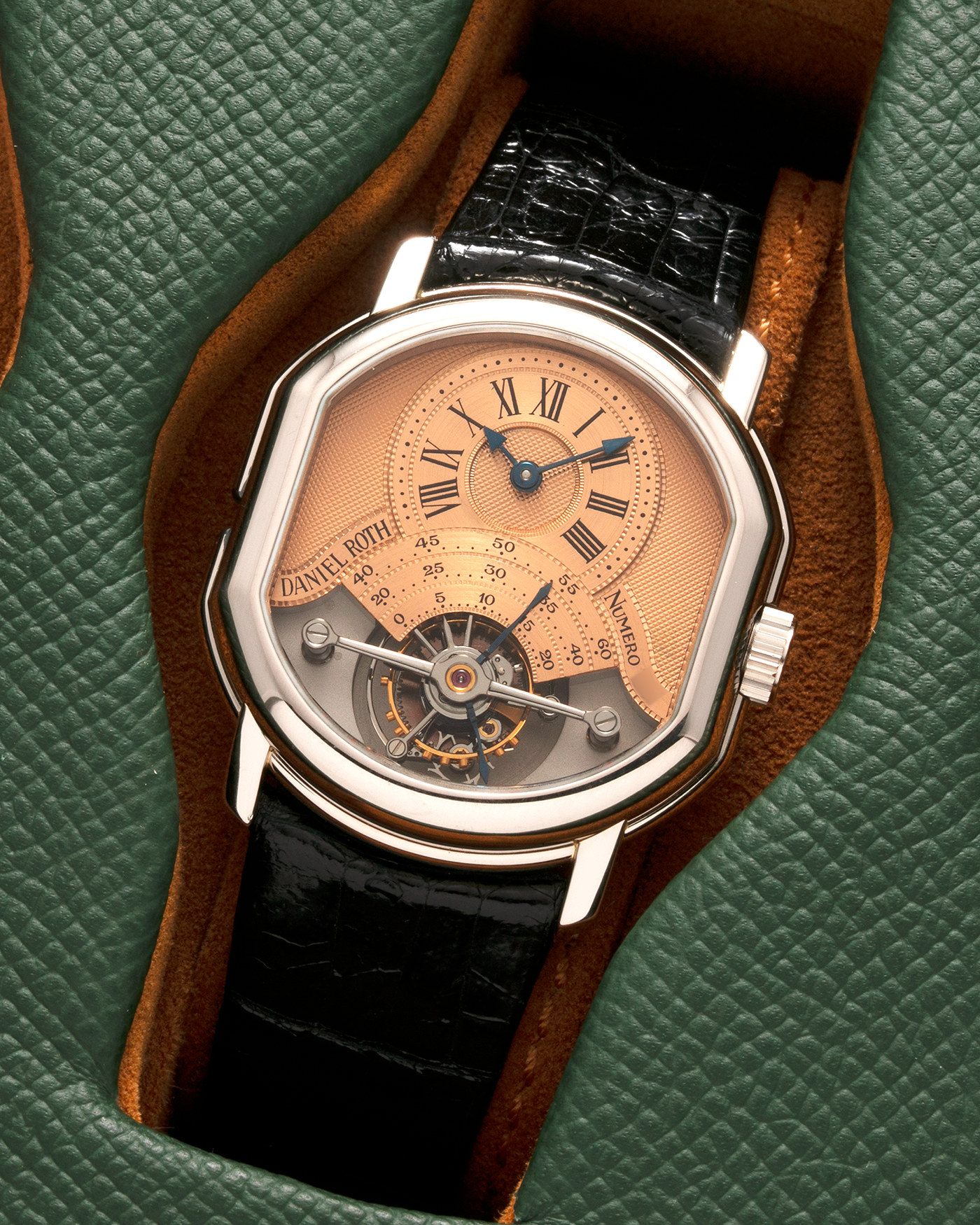 Brand: Daniel Roth Year: 1990’s Model: 2187 Tourbillon (Possibly Piece Unique) Material: 18-Carat White Gold  Movement: Cal. DR 307 One-Minute Tourbillon Regulator, Manual-Winding  Case Diameter: 35mm x 38mm Strap: Daniel Roth Black Alligator Leather with Signed 180carat White Gold Tang Buckle