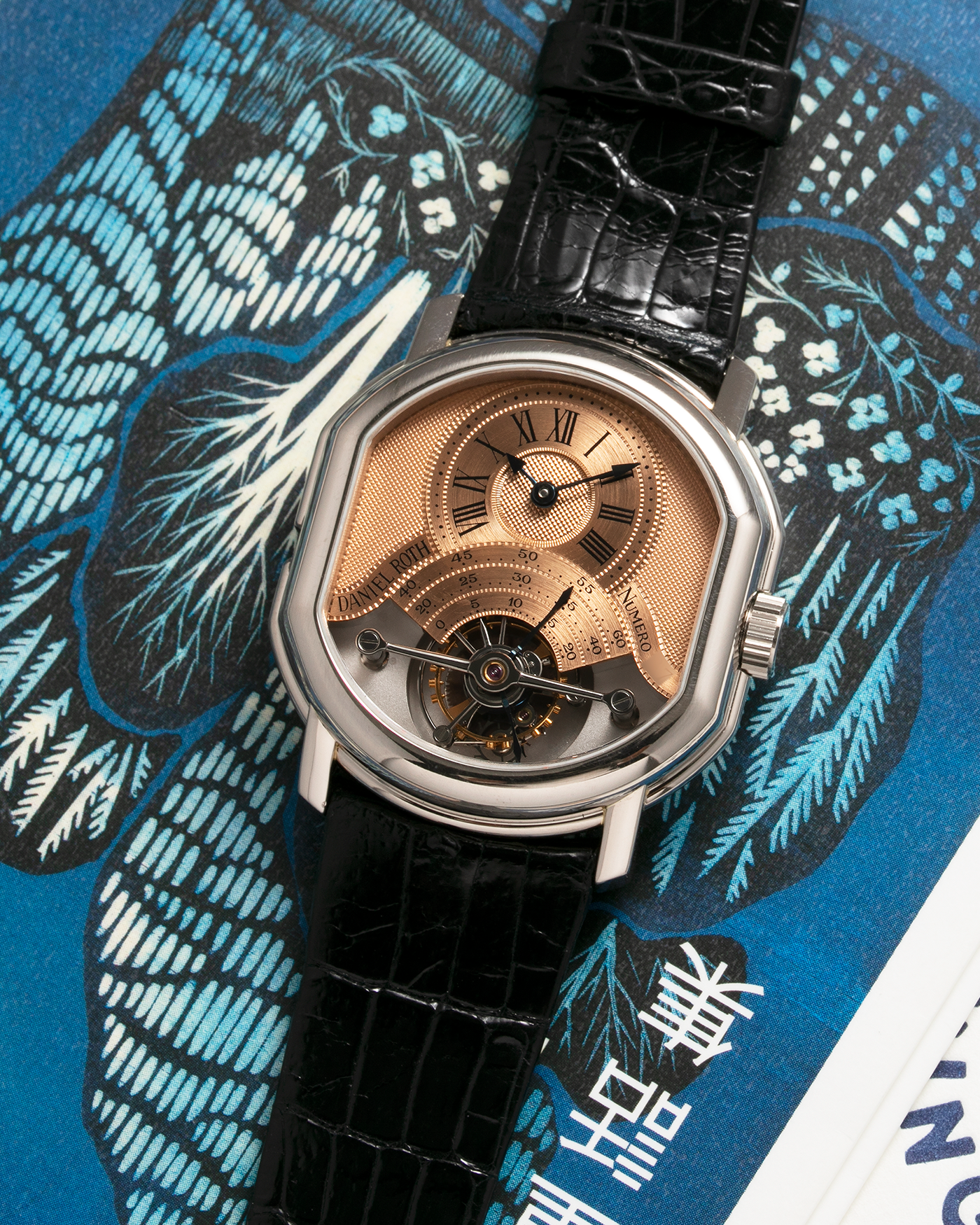 Brand: Daniel Roth Year: 1990’s Model: 2187 Tourbillon (Possibly Piece Unique) Material: 18-Carat White Gold  Movement: Cal. DR 307 One-Minute Tourbillon Regulator, Manual-Winding  Case Diameter: 35mm x 38mm Strap: Daniel Roth Black Alligator Leather with Signed 180carat White Gold Tang Buckle