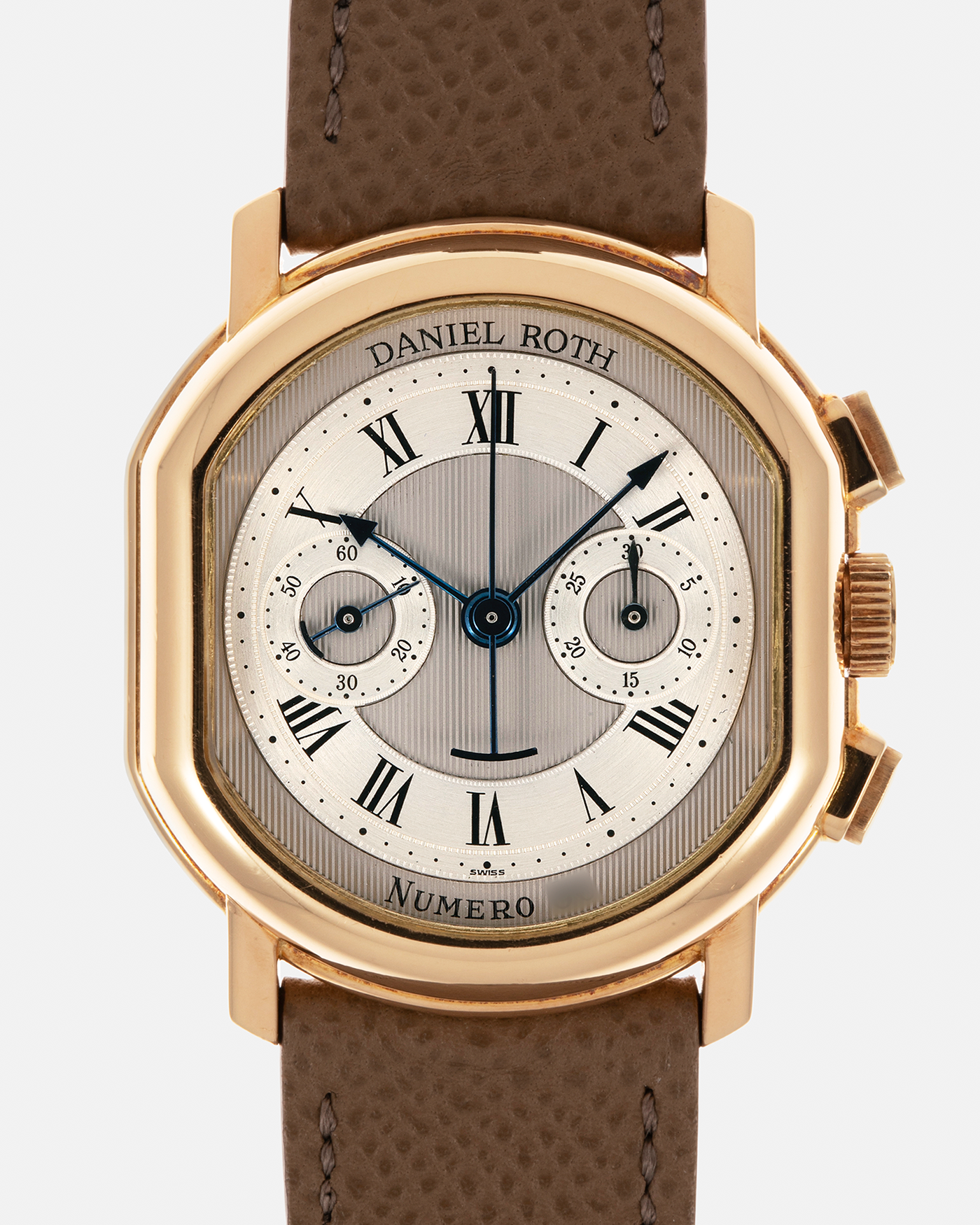 Brand: Daniel Roth
Year: 1990’s
Model: 2147 Chronograph (First Generation)
Material: 18-carat Yellow Gold
Movement: Lemania Cal. 2320, Manual-Winding
Case Dimensions: 35mm x 38mm (Lug-to-Lug 41.5mm)
Lug Width: 20mm
Strap: Nostime Taupe Brown Textured Calf Leather with Signed 18-carat Yellow Gold Tang Buckle