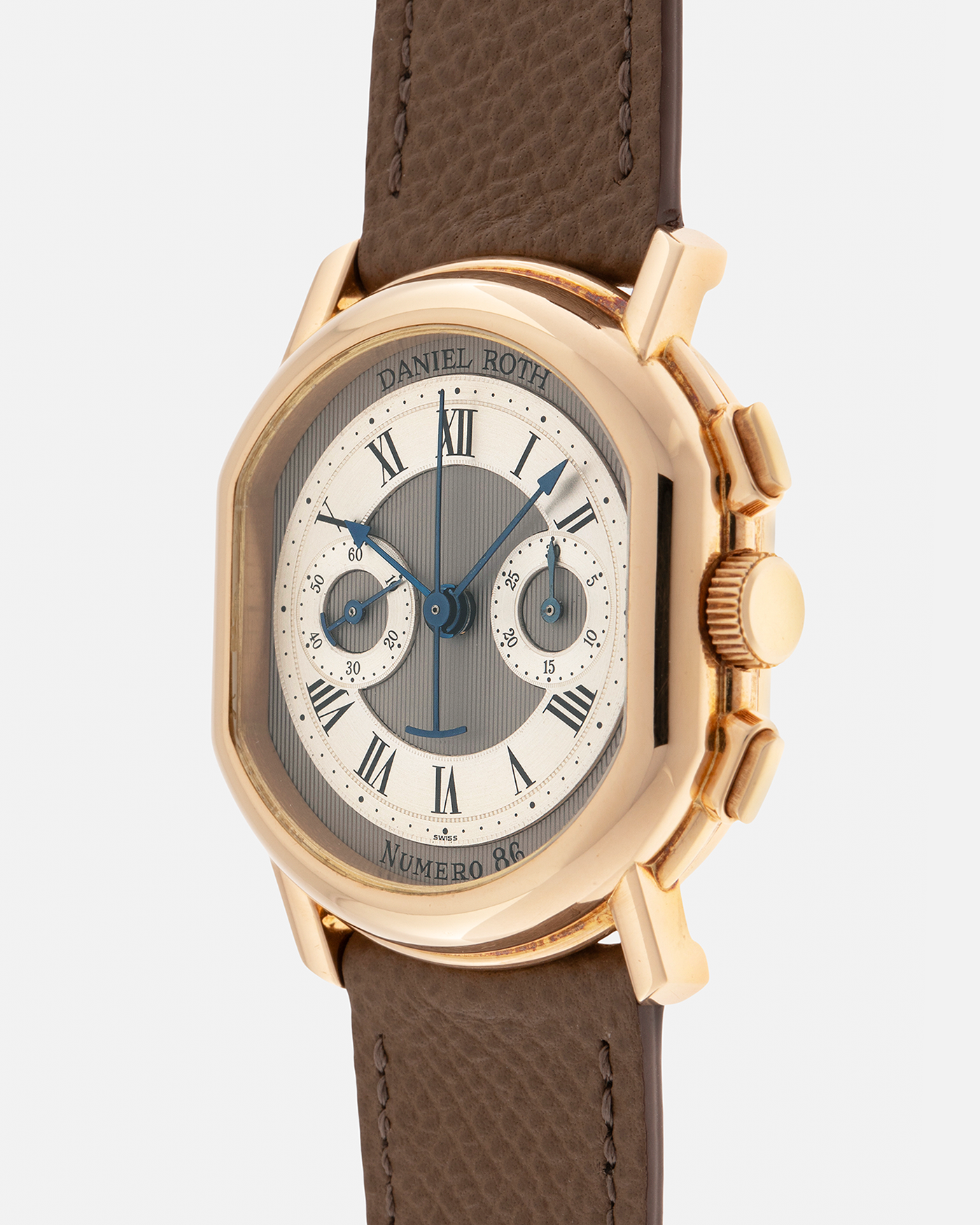 Brand: Daniel Roth
Year: 1990’s
Model: 2147 Chronograph (First Generation)
Material: 18-carat Yellow Gold
Movement: Lemania Cal. 2320, Manual-Winding
Case Dimensions: 35mm x 38mm (Lug-to-Lug 41.5mm)
Lug Width: 20mm
Strap: Nostime Taupe Brown Textured Calf Leather with Signed 18-carat Yellow Gold Tang Buckle