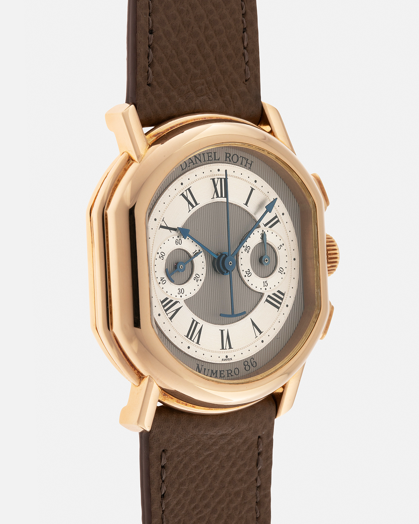 Brand: Daniel Roth
Year: 1990’s
Model: 2147 Chronograph (First Generation)
Material: 18-carat Yellow Gold
Movement: Lemania Cal. 2320, Manual-Winding
Case Dimensions: 35mm x 38mm (Lug-to-Lug 41.5mm)
Lug Width: 20mm
Strap: Nostime Taupe Brown Textured Calf Leather with Signed 18-carat Yellow Gold Tang Buckle