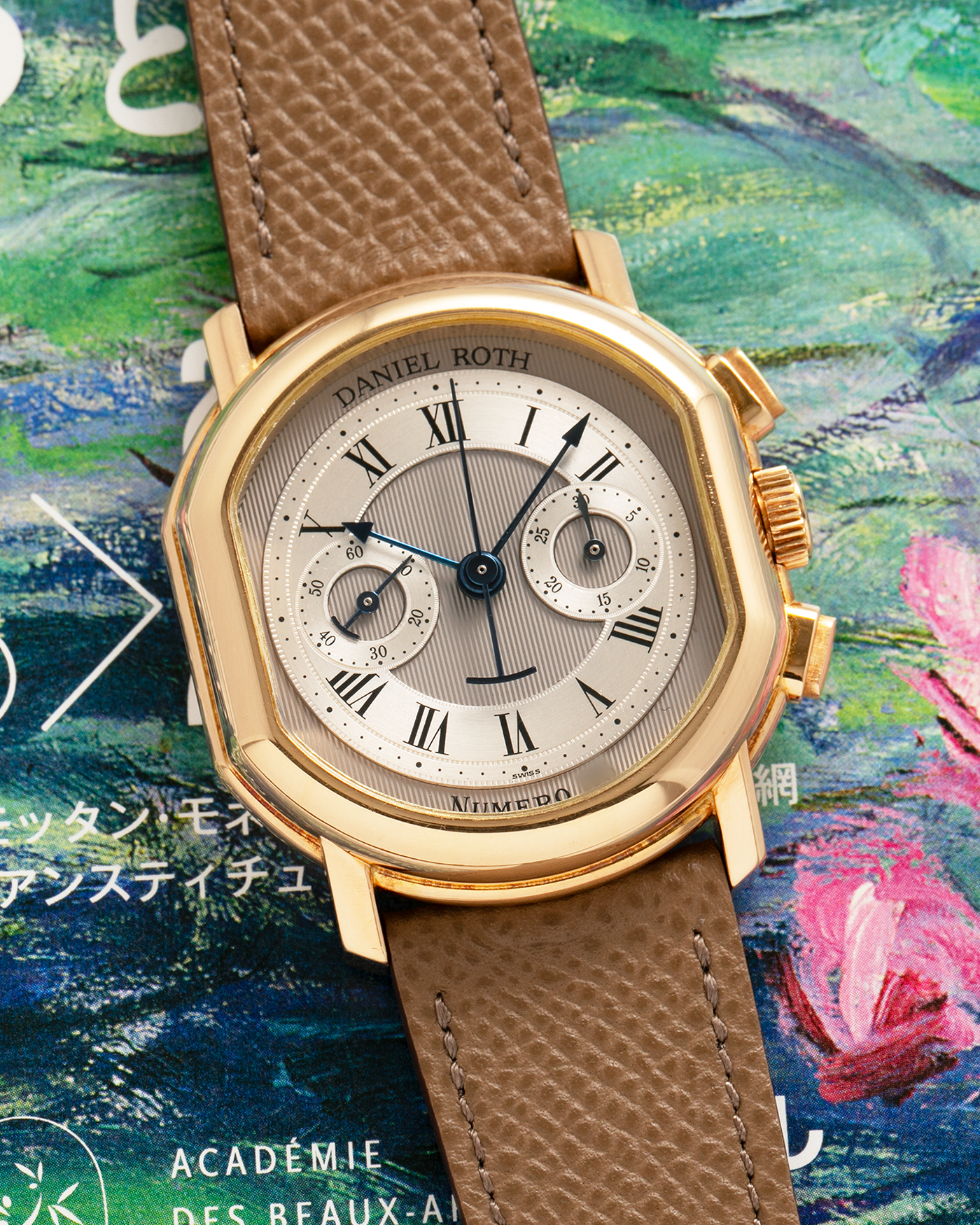 Brand: Daniel Roth
Year: 1990’s
Model: 2147 Chronograph (First Generation)
Material: 18-carat Yellow Gold
Movement: Lemania Cal. 2320, Manual-Winding
Case Dimensions: 35mm x 38mm (Lug-to-Lug 41.5mm)
Lug Width: 20mm
Strap: Nostime Taupe Brown Textured Calf Leather with Signed 18-carat Yellow Gold Tang Buckle