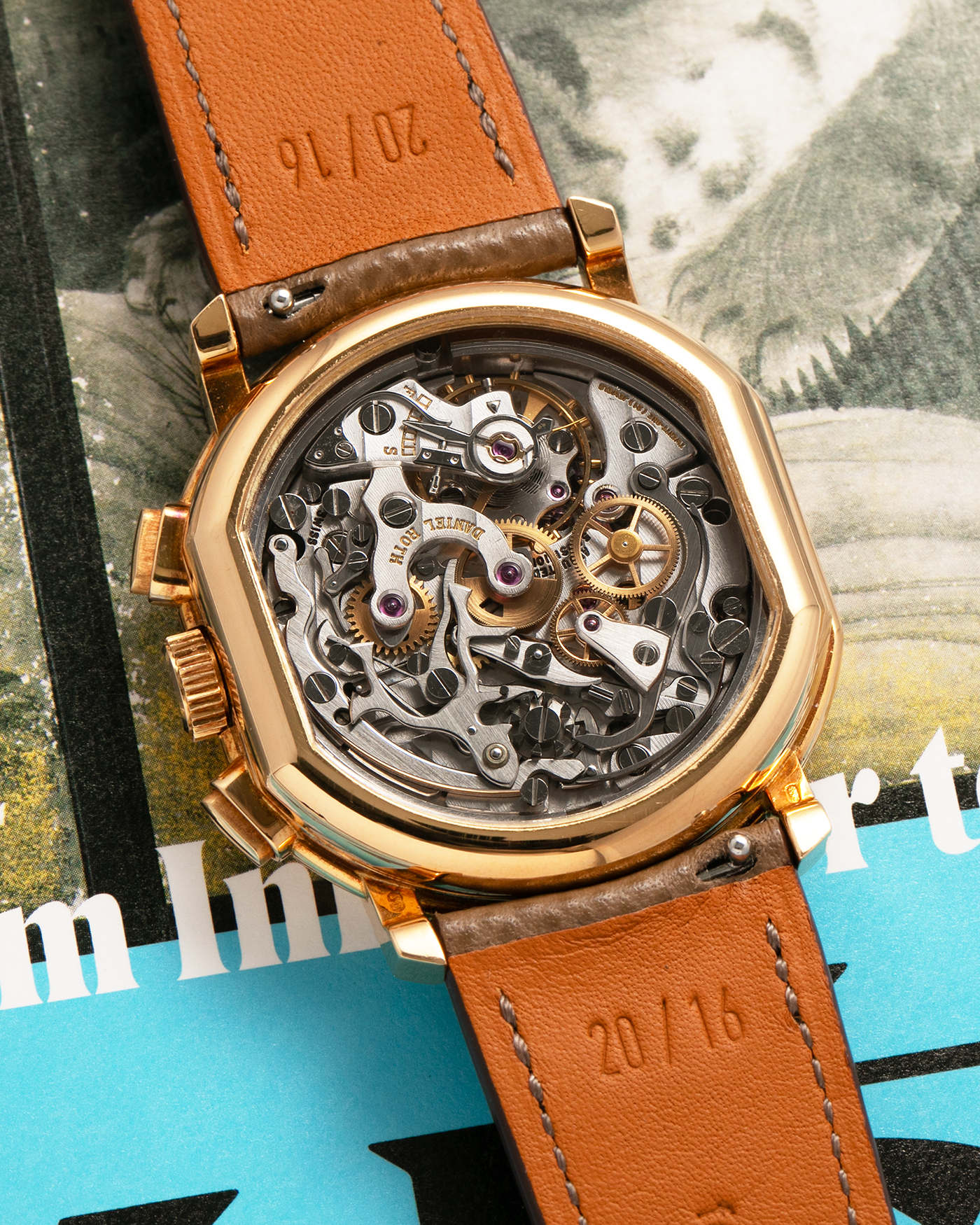 Brand: Daniel Roth
Year: 1990’s
Model: 2147 Chronograph (First Generation)
Material: 18-carat Yellow Gold
Movement: Lemania Cal. 2320, Manual-Winding
Case Dimensions: 35mm x 38mm (Lug-to-Lug 41.5mm)
Lug Width: 20mm
Strap: Nostime Taupe Brown Textured Calf Leather with Signed 18-carat Yellow Gold Tang Buckle