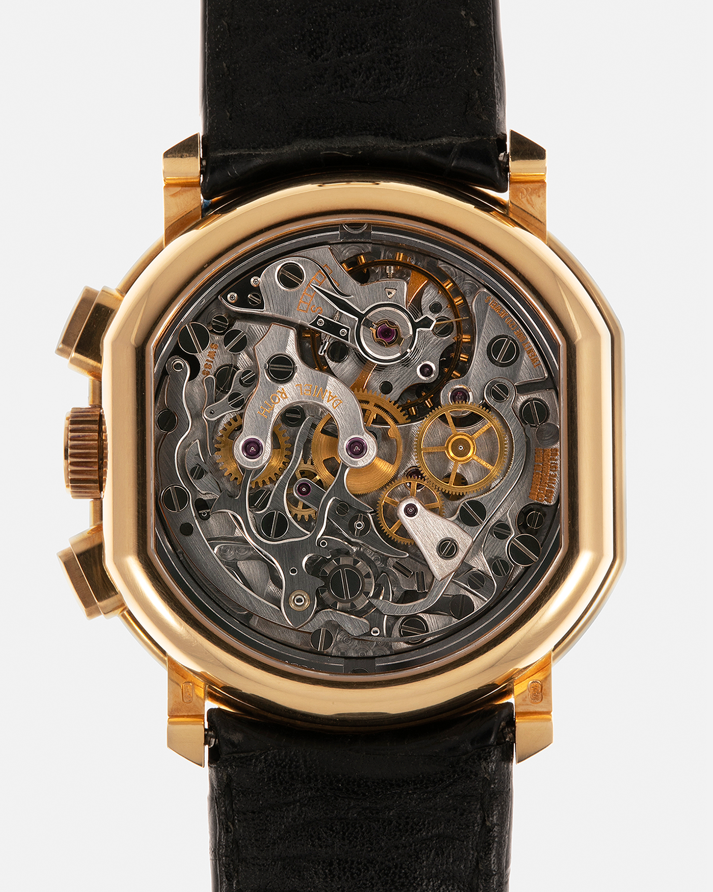 Brand: Daniel Roth
Year: 1990’s
Model: 2147 Chronograph (First Generation)
Material: 18-carat Yellow Gold
Movement: Lemania Cal. 2320, Manual-Winding
Case Dimensions: 35mm x 38mm (Lug-to-Lug 41.5mm)
Lug Width: 20mm
Strap: Daniel Roth Black Alligator Leather Strap with Signed 18-carat Yellow Gold Tang Buckle