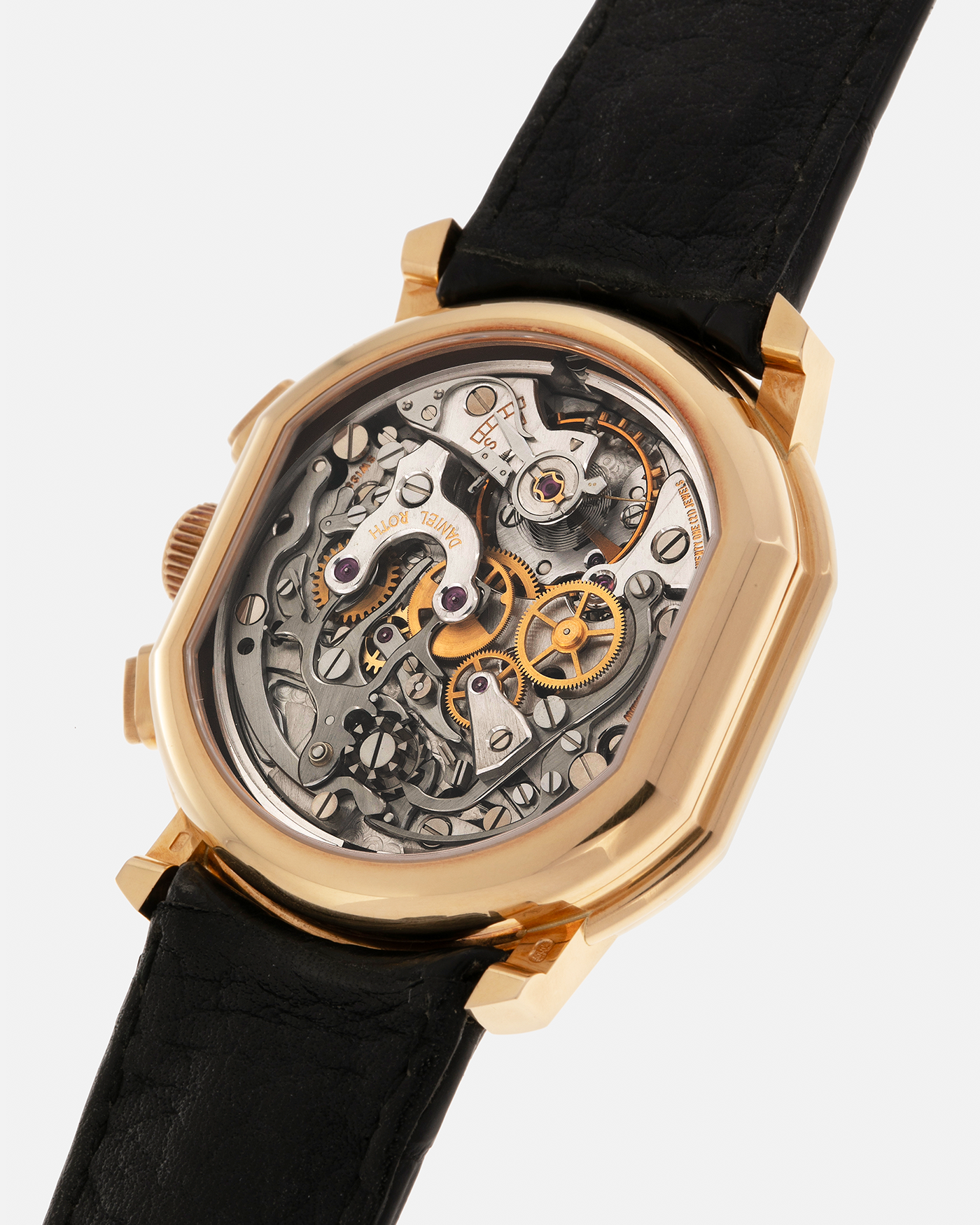 Brand: Daniel Roth
Year: 1990’s
Model: 2147 Chronograph (First Generation)
Material: 18-carat Yellow Gold
Movement: Lemania Cal. 2320, Manual-Winding
Case Dimensions: 35mm x 38mm (Lug-to-Lug 41.5mm)
Lug Width: 20mm
Strap: Daniel Roth Black Alligator Leather Strap with Signed 18-carat Yellow Gold Tang Buckle