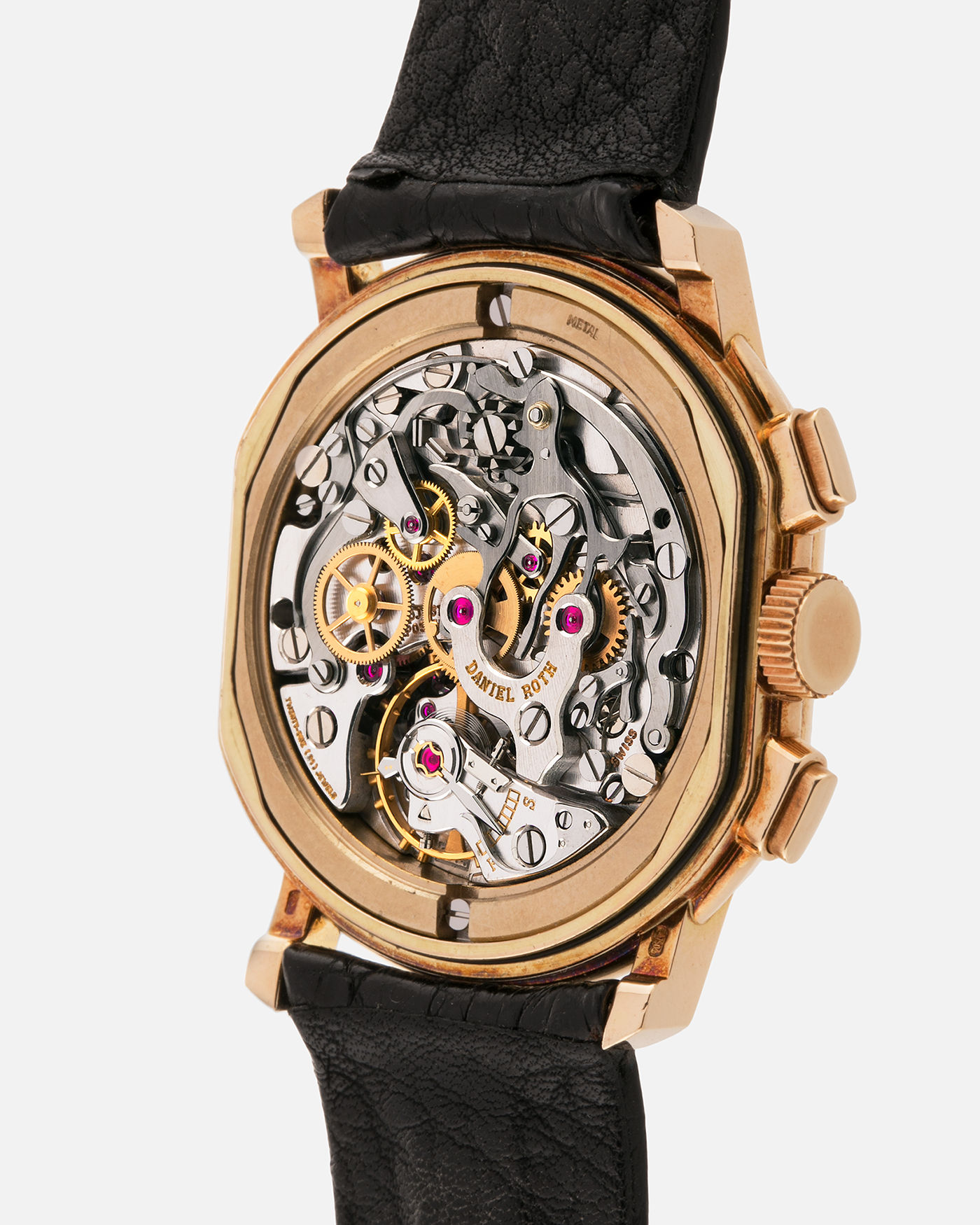 Brand: Daniel Roth
Year: Early 1990s
Model: 2147 Chronograph
Material: 18-carat Yellow Gold
Movement: Lemania Cal. 2320, Manual-Winding
Case Diameter: 35mm x 38mm (10mm Thickness)
Lug Width: 20mm
Strap: Daniel Roth Black Alligator Strap and 18k Yellow Gold Daniel Roth Tang Buckle