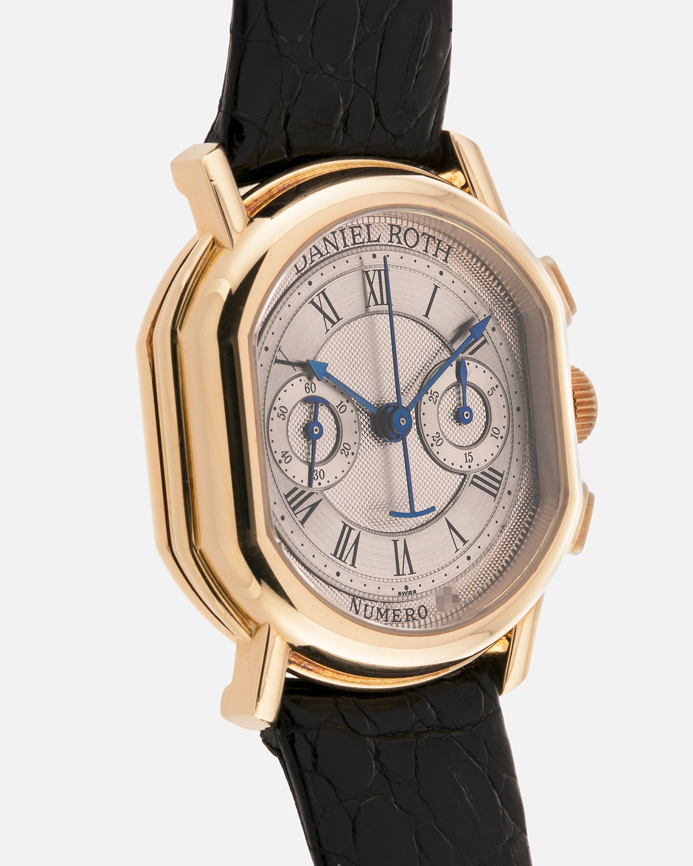 Brand: Daniel Roth
Year: Early 1990s
Model: 2147 Chronograph
Material: 18-carat Yellow Gold
Movement: Lemania Cal. 2320, Manual-Winding
Case Diameter: 35mm x 38mm (10mm Thickness)
Lug Width: 20mm
Strap: Daniel Roth Black Alligator Strap and 18k Yellow Gold Daniel Roth Tang Buckle