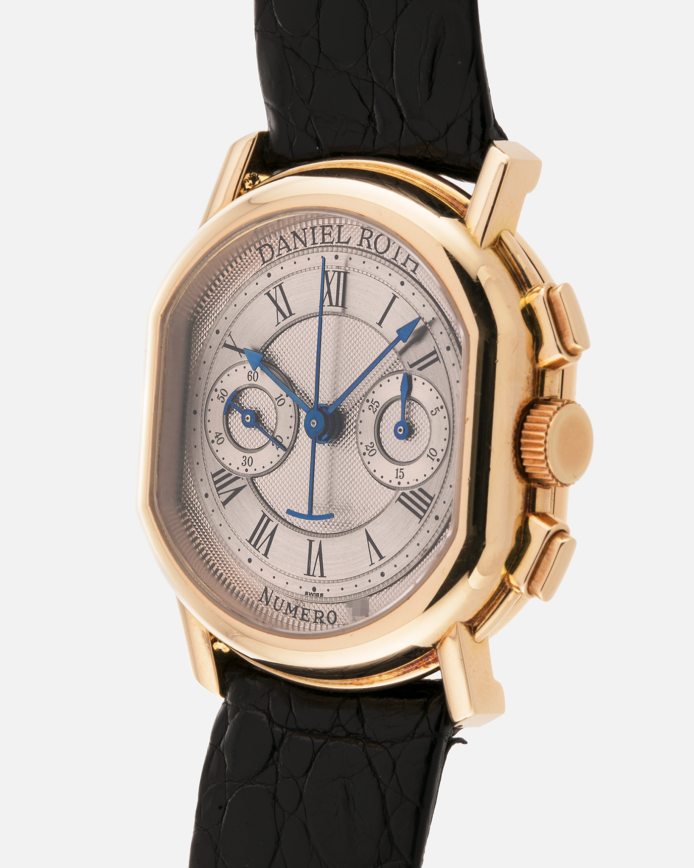 Brand: Daniel Roth
Year: Early 1990s
Model: 2147 Chronograph
Material: 18-carat Yellow Gold
Movement: Lemania Cal. 2320, Manual-Winding
Case Diameter: 35mm x 38mm (10mm Thickness)
Lug Width: 20mm
Strap: Daniel Roth Black Alligator Strap and 18k Yellow Gold Daniel Roth Tang Buckle