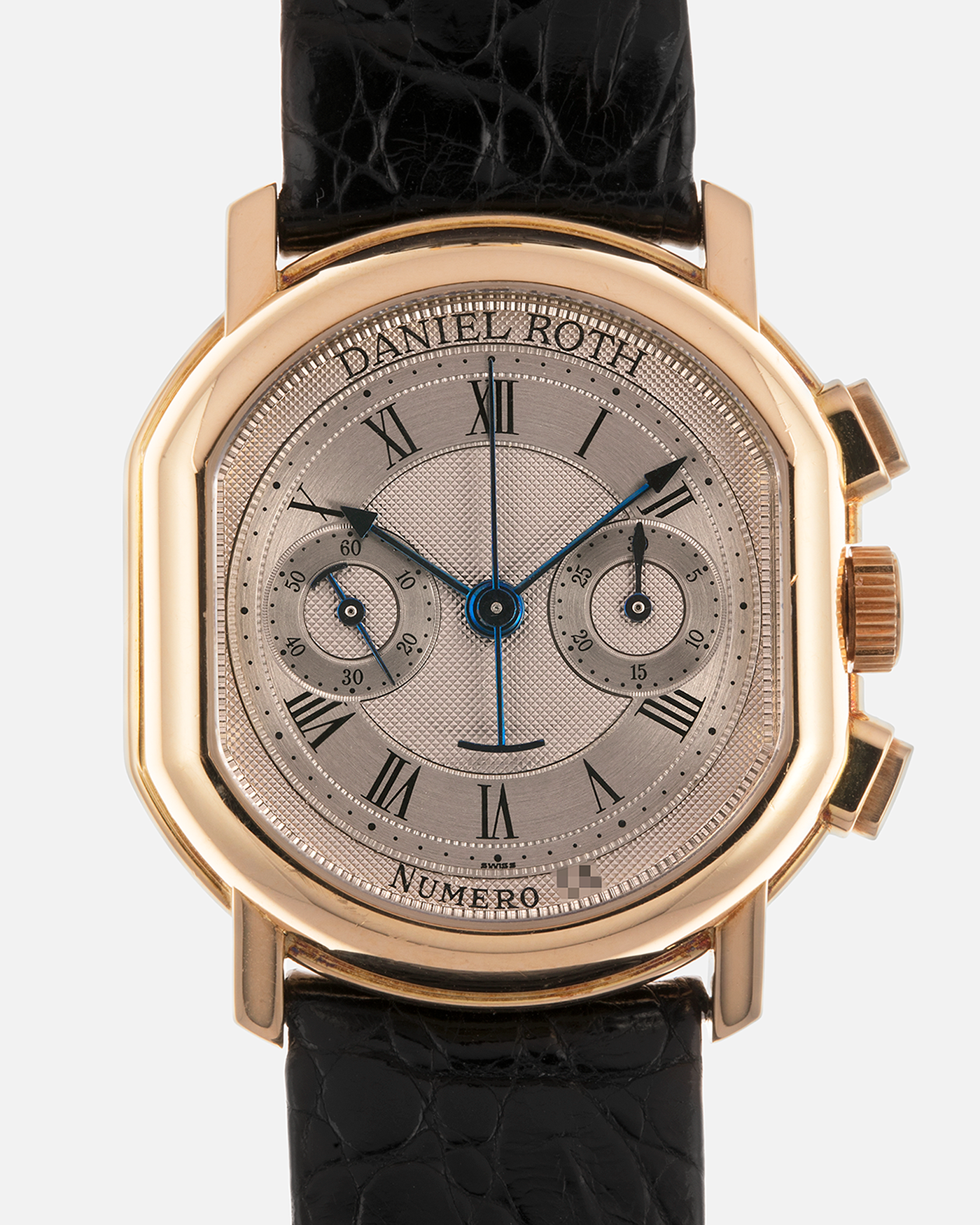 Brand: Daniel Roth
Year: Early 1990s
Model: 2147 Chronograph
Material: 18-carat Yellow Gold
Movement: Lemania Cal. 2320, Manual-Winding
Case Diameter: 35mm x 38mm (10mm Thickness)
Lug Width: 20mm
Strap: Daniel Roth Black Alligator Strap and 18k Yellow Gold Daniel Roth Tang Buckle