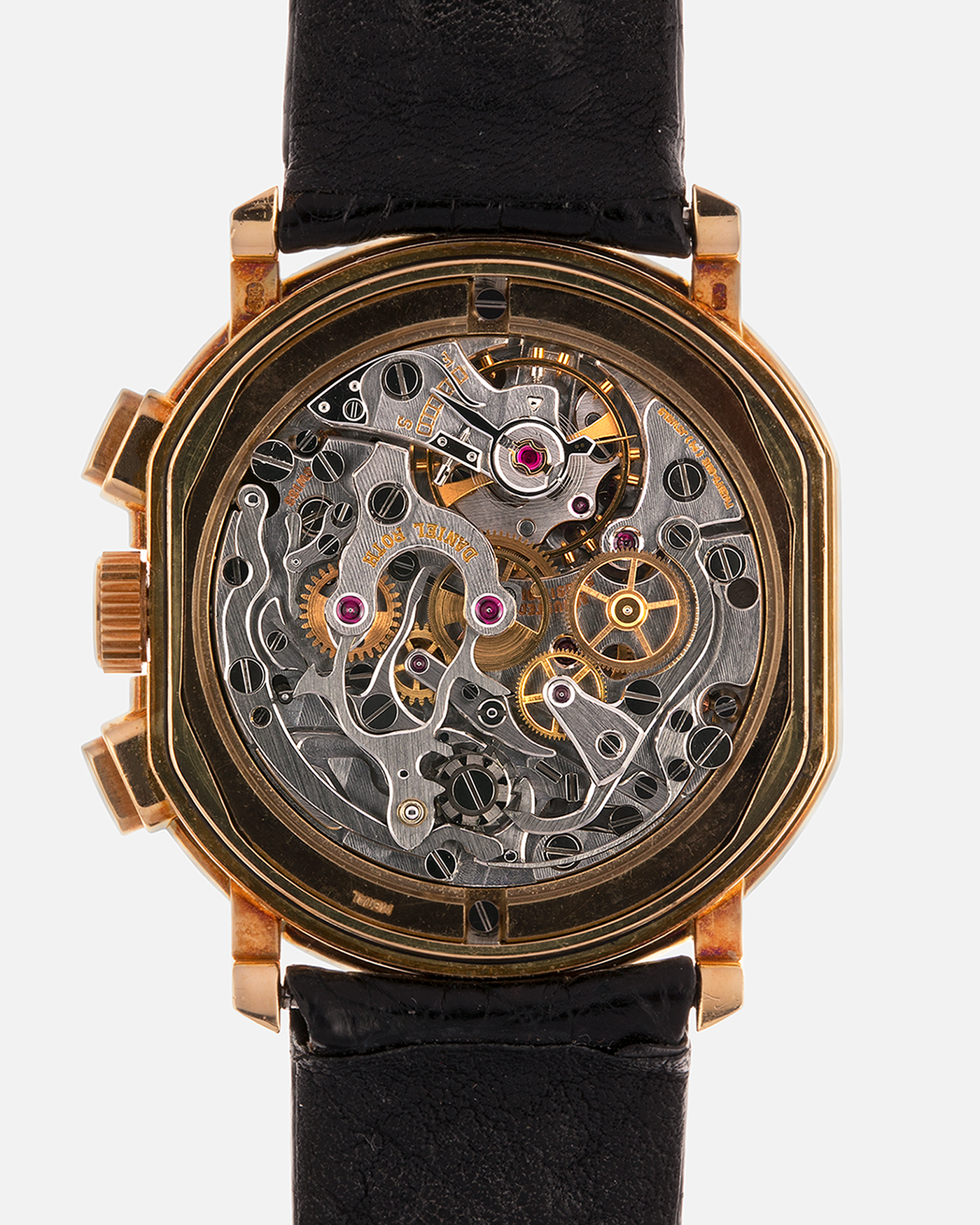 Brand: Daniel Roth
Year: Early 1990s
Model: 2147 Chronograph
Material: 18-carat Yellow Gold
Movement: Lemania Cal. 2320, Manual-Winding
Case Diameter: 35mm x 38mm (10mm Thickness)
Lug Width: 20mm
Strap: Daniel Roth Black Alligator Strap and 18k Yellow Gold Daniel Roth Tang Buckle