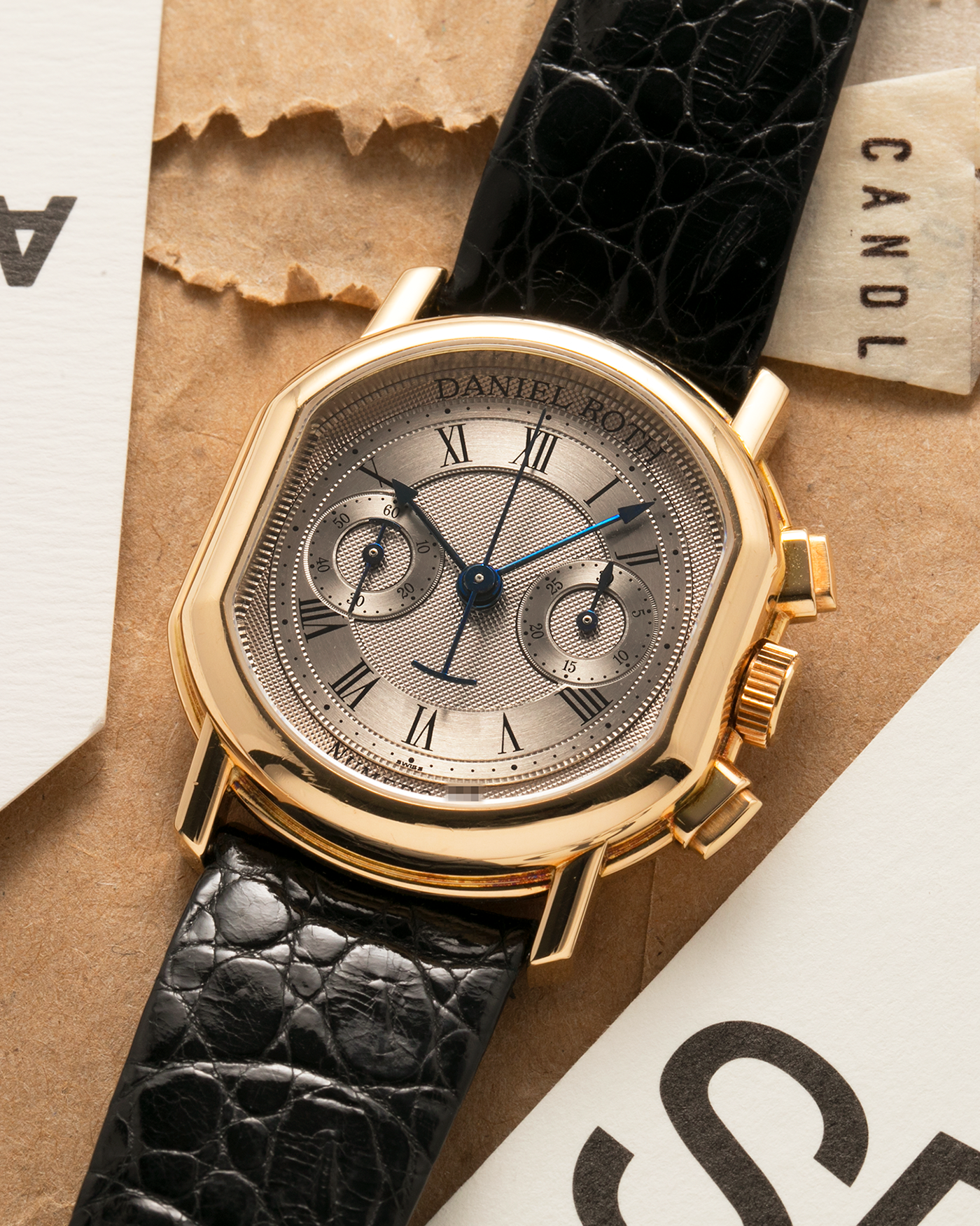 Brand: Daniel Roth
Year: Early 1990s
Model: 2147 Chronograph
Material: 18-carat Yellow Gold
Movement: Lemania Cal. 2320, Manual-Winding
Case Diameter: 35mm x 38mm (10mm Thickness)
Lug Width: 20mm
Strap: Daniel Roth Black Alligator Strap and 18k Yellow Gold Daniel Roth Tang Buckle