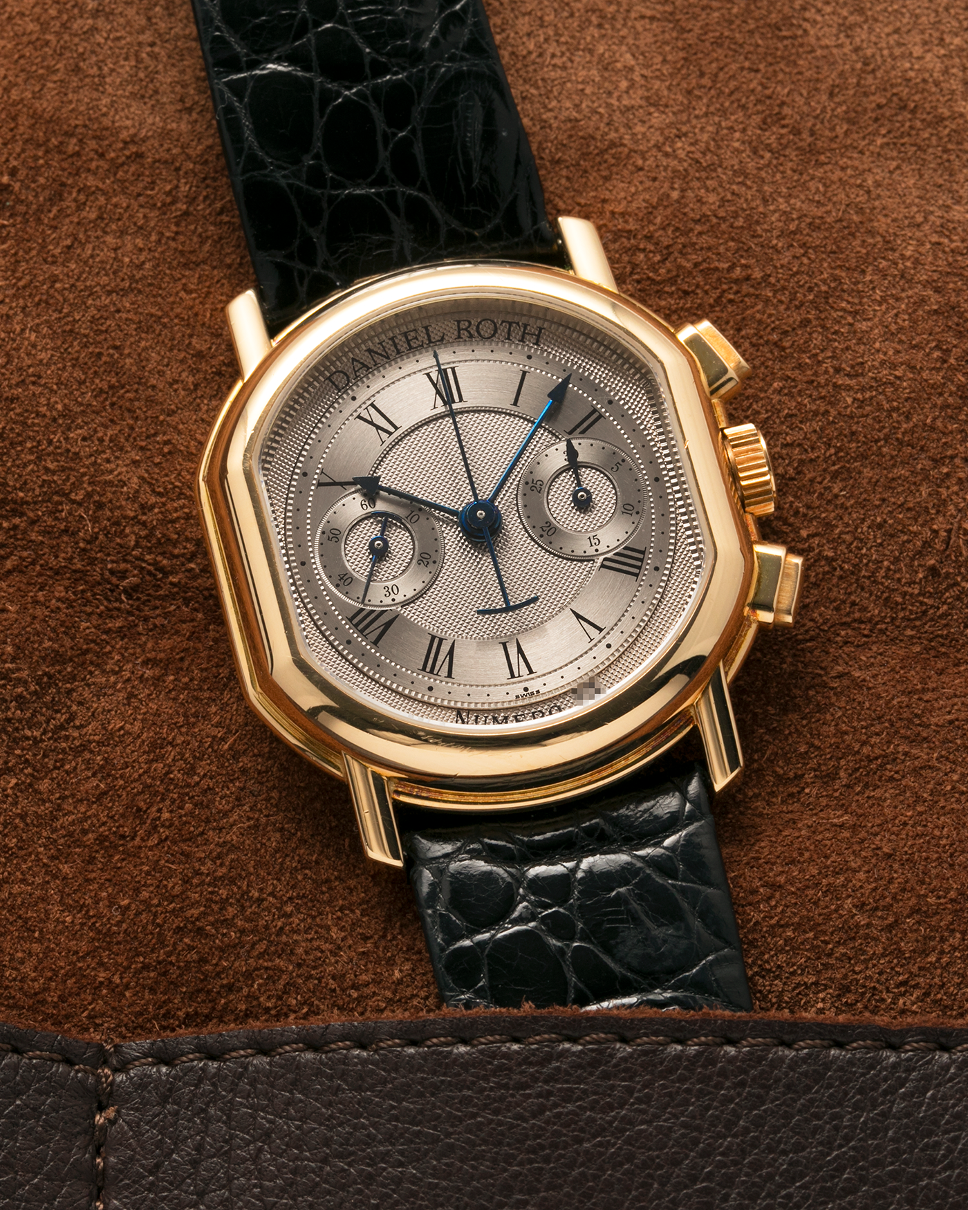 Brand: Daniel Roth
Year: Early 1990s
Model: 2147 Chronograph
Material: 18-carat Yellow Gold
Movement: Lemania Cal. 2320, Manual-Winding
Case Diameter: 35mm x 38mm (10mm Thickness)
Lug Width: 20mm
Strap: Daniel Roth Black Alligator Strap and 18k Yellow Gold Daniel Roth Tang Buckle