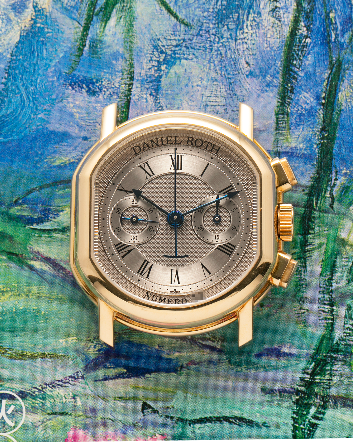 Brand: Daniel Roth
Year: Early 1990s
Model: 2147 Chronograph
Material: 18-carat Yellow Gold
Movement: Lemania Cal. 2320, Manual-Winding
Case Diameter: 35mm x 38mm (10mm Thickness)
Lug Width: 20mm
Strap: Daniel Roth Black Alligator Strap and 18k Yellow Gold Daniel Roth Tang Buckle