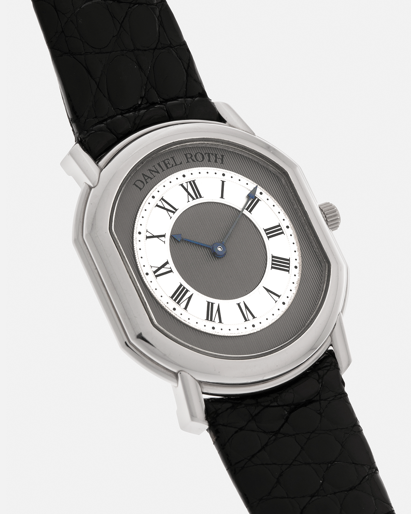 Brand: Daniel Roth
Year: 1990’s
Model: 2107
Material: Platinum 950
Movement: Frederic Piguet Cal. 71, Self-Winding
Case Dimensions: 35mm x 38mm x 6.5mm (Lug-to-Lug 41mm)
Lug Width: 20mm
Strap: Daniel Roth Black Alligator Leather Strap with Signed Platinum 950 Tang Buckle