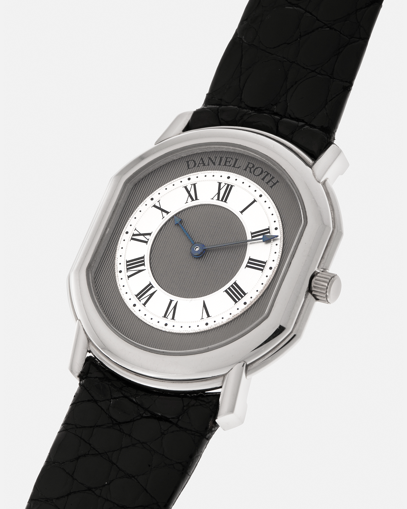 Brand: Daniel Roth
Year: 1990’s
Model: 2107
Material: Platinum 950
Movement: Frederic Piguet Cal. 71, Self-Winding
Case Dimensions: 35mm x 38mm x 6.5mm (Lug-to-Lug 41mm)
Lug Width: 20mm
Strap: Daniel Roth Black Alligator Leather Strap with Signed Platinum 950 Tang Buckle