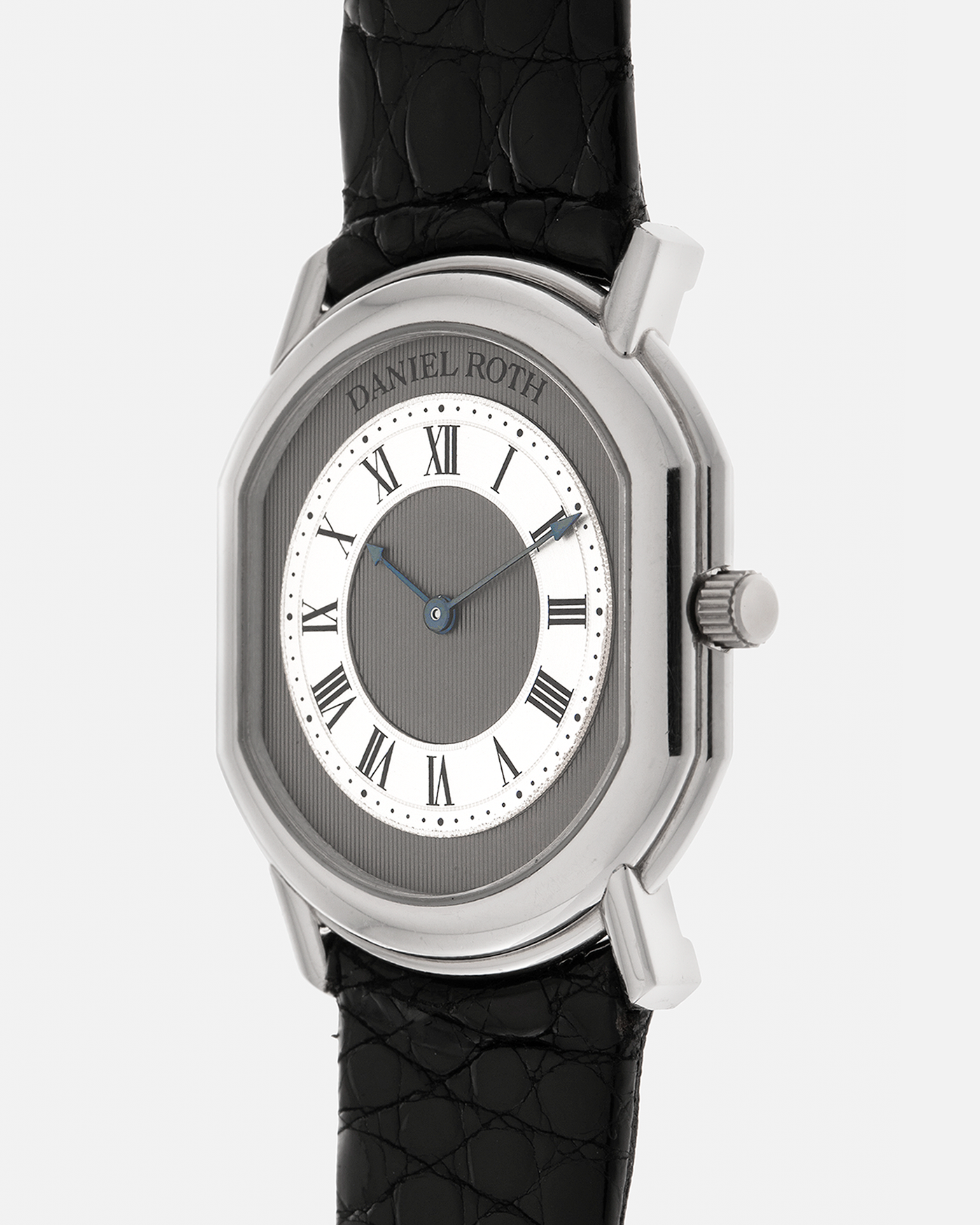 Brand: Daniel Roth
Year: 1990’s
Model: 2107
Material: Platinum 950
Movement: Frederic Piguet Cal. 71, Self-Winding
Case Dimensions: 35mm x 38mm x 6.5mm (Lug-to-Lug 41mm)
Lug Width: 20mm
Strap: Daniel Roth Black Alligator Leather Strap with Signed Platinum 950 Tang Buckle
