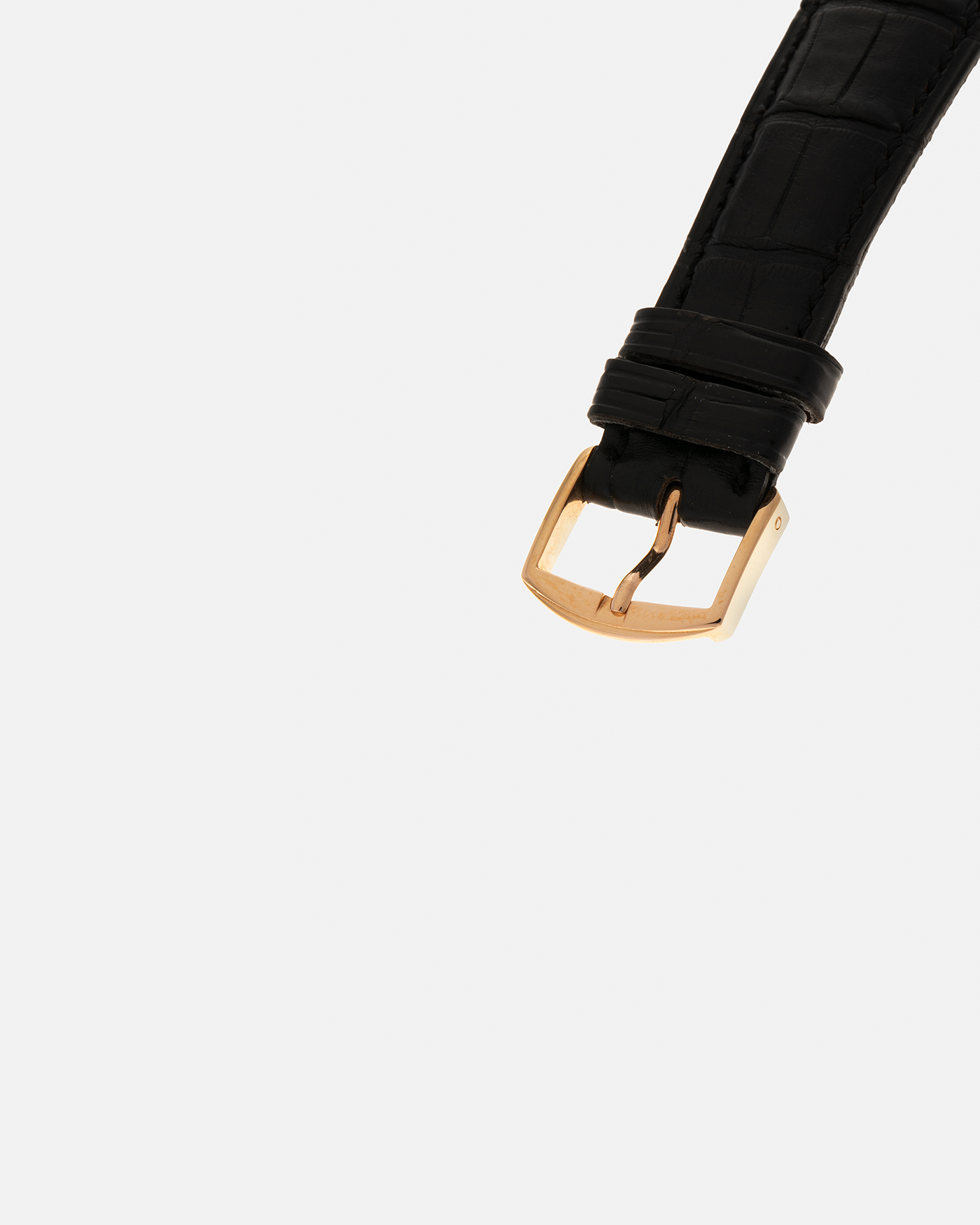 Brand: Daniel Roth
Year: 1990s
Model: GMT
Material: 18-carat Yellow Gold
Movement: Heavily-Modified Girard Perregaux Cal. GP3100, Self-Winding
Case Diameter: 35mm x 38mm (Lug-to-Lug 41mm)
Lug Width: 19mm
Strap: Cellini Black Alligator Leather Strap with Signed 18-carat Yellow Gold Tang Buckle