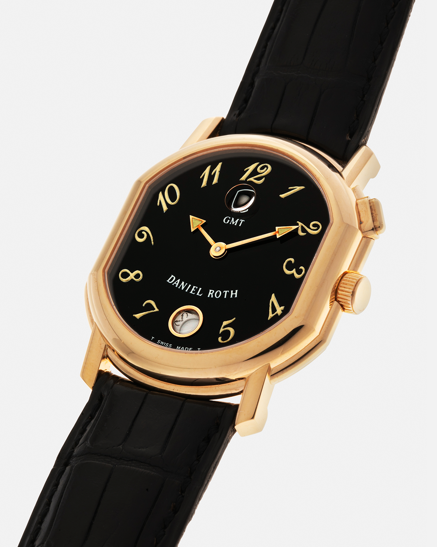 Brand: Daniel Roth
Year: 1990s
Model: GMT
Material: 18-carat Yellow Gold
Movement: Heavily-Modified Girard Perregaux Cal. GP3100, Self-Winding
Case Diameter: 35mm x 38mm (Lug-to-Lug 41mm)
Lug Width: 19mm
Strap: Cellini Black Alligator Leather Strap with Signed 18-carat Yellow Gold Tang Buckle