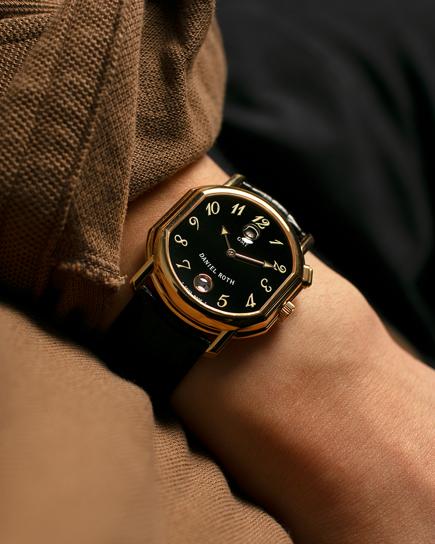 Brand: Daniel Roth
Year: 1990s
Model: GMT
Material: 18-carat Yellow Gold
Movement: Heavily-Modified Girard Perregaux Cal. GP3100, Self-Winding
Case Diameter: 35mm x 38mm (Lug-to-Lug 41mm)
Lug Width: 19mm
Strap: Cellini Black Alligator Leather Strap with Signed 18-carat Yellow Gold Tang Buckle