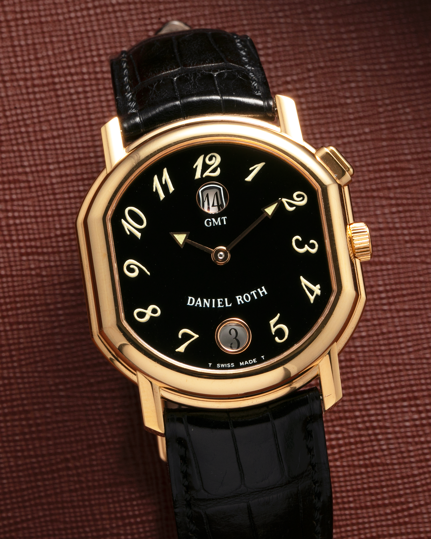 Brand: Daniel Roth
Year: 1990s
Model: GMT
Material: 18-carat Yellow Gold
Movement: Heavily-Modified Girard Perregaux Cal. GP3100, Self-Winding
Case Diameter: 35mm x 38mm (Lug-to-Lug 41mm)
Lug Width: 19mm
Strap: Cellini Black Alligator Leather Strap with Signed 18-carat Yellow Gold Tang Buckle