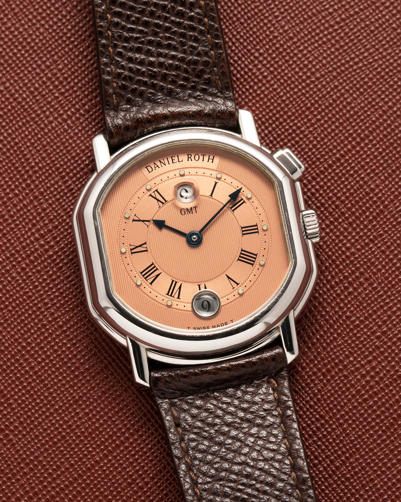 Brand: Daniel Roth
Year: 1990’s
Model: GMT Salmon
Material: Stainless Steel
Movement: Heavily-Modified Girard Perregaux Cal. GP3100, Self-Winding
Case Dimensions: 35mm x 38mm (Lug-to-Lug 41.5mm)
Lug Width: 20mm
Strap: JPM x S.SONG Dark Brown Textured Calf Leather Strap with Signed Stainless Steel Deployant Clasp