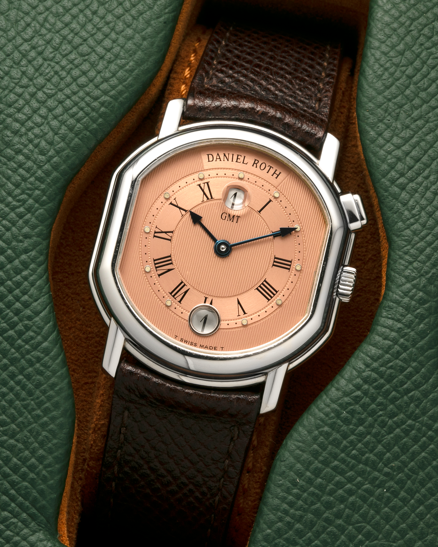 Brand: Daniel Roth
Year: 1990’s
Model: GMT Salmon
Material: Stainless Steel
Movement: Heavily-Modified Girard Perregaux Cal. GP3100, Self-Winding
Case Dimensions: 35mm x 38mm (Lug-to-Lug 41.5mm)
Lug Width: 20mm
Strap: JPM x S.SONG Dark Brown Textured Calf Leather Strap with Signed Stainless Steel Deployant Clasp