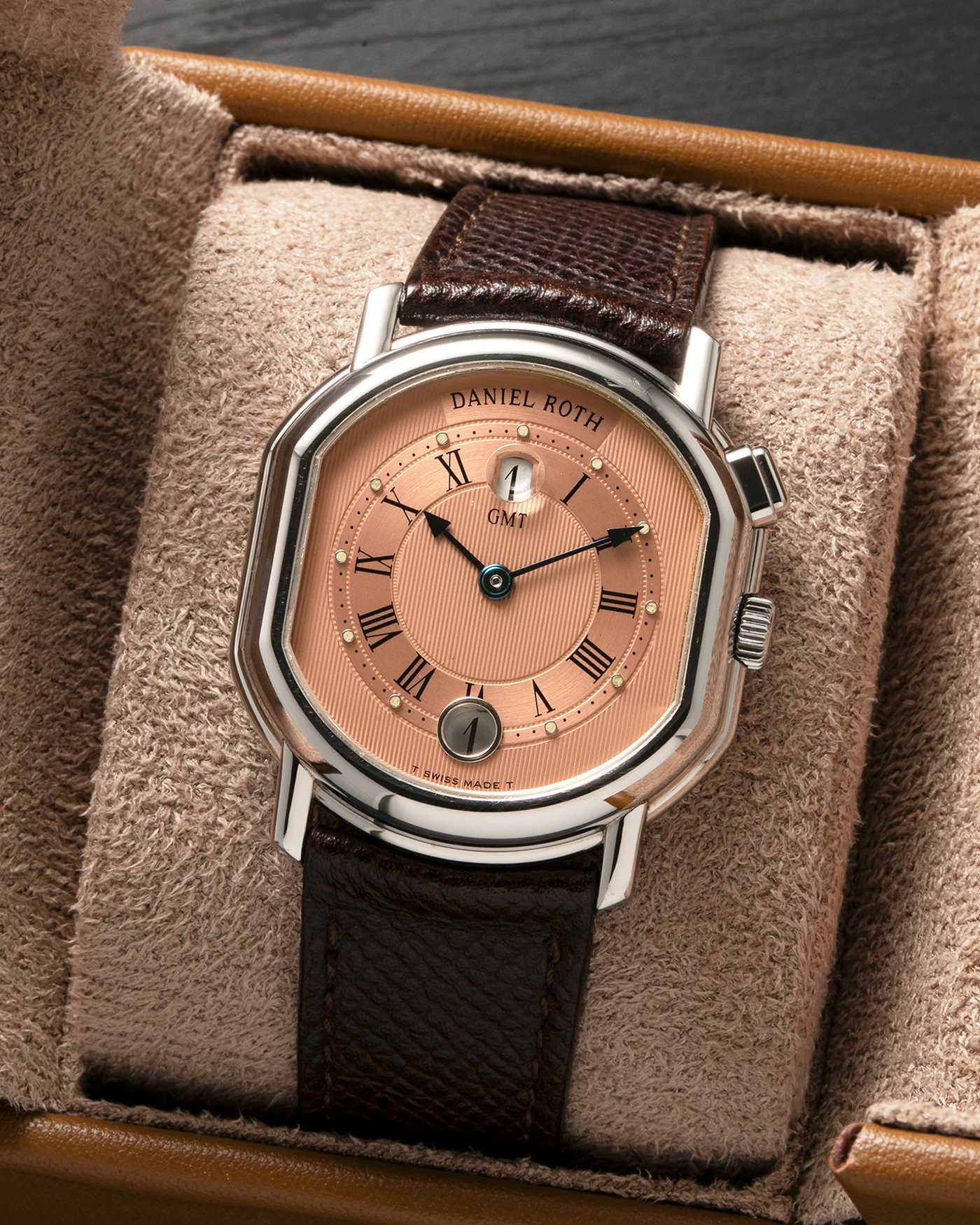 Brand: Daniel Roth
Year: 1990’s
Model: GMT Salmon
Material: Stainless Steel
Movement: Heavily-Modified Girard Perregaux Cal. GP3100, Self-Winding
Case Dimensions: 35mm x 38mm (Lug-to-Lug 41.5mm)
Lug Width: 20mm
Strap: JPM x S.SONG Dark Brown Textured Calf Leather Strap with Signed Stainless Steel Deployant Clasp