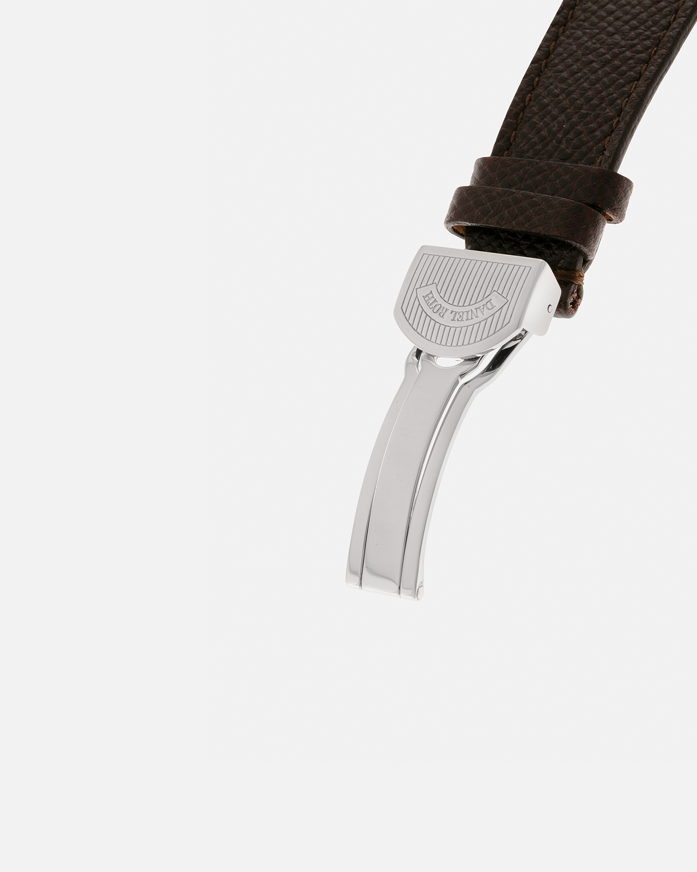 Brand: Daniel Roth
Year: 1990’s
Model: GMT Salmon
Material: Stainless Steel
Movement: Heavily-Modified Girard Perregaux Cal. GP3100, Self-Winding
Case Dimensions: 35mm x 38mm (Lug-to-Lug 41.5mm)
Lug Width: 20mm
Strap: JPM x S.SONG Dark Brown Textured Calf Leather Strap with Signed Stainless Steel Deployant Clasp