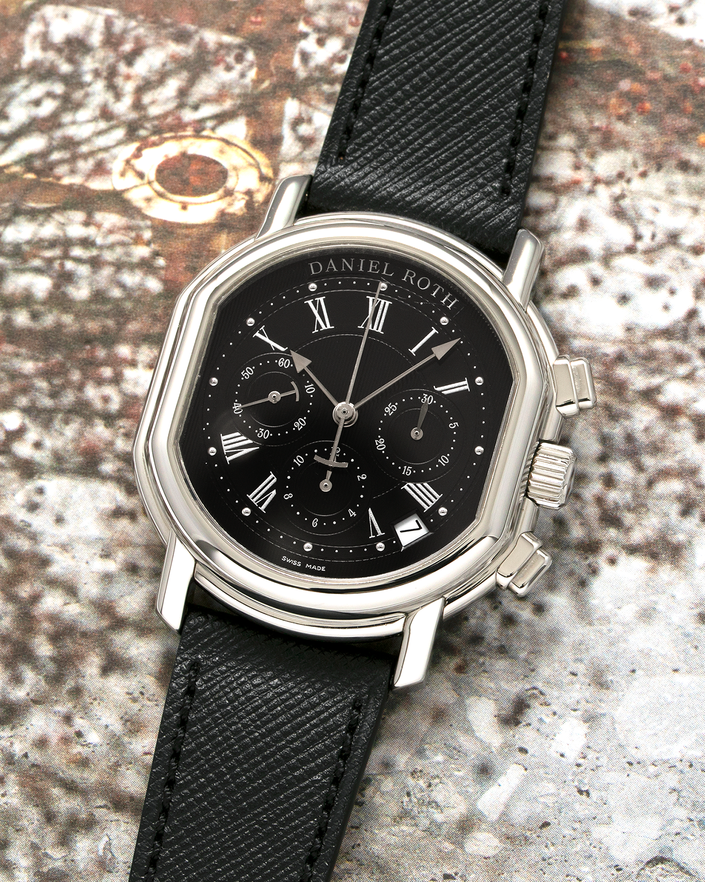 Brand: Daniel Roth Year: Late 1990’s Model: Masters Chronograph S247 Material: Stainless Steel Movement: Zenith El Primero Cal. 400, Self-Winding Case Diameter: 38.5mm x 41.5mm Strap: Molequin Black Grained Calf and Daniel Roth Stainless Steel Tang Buckle