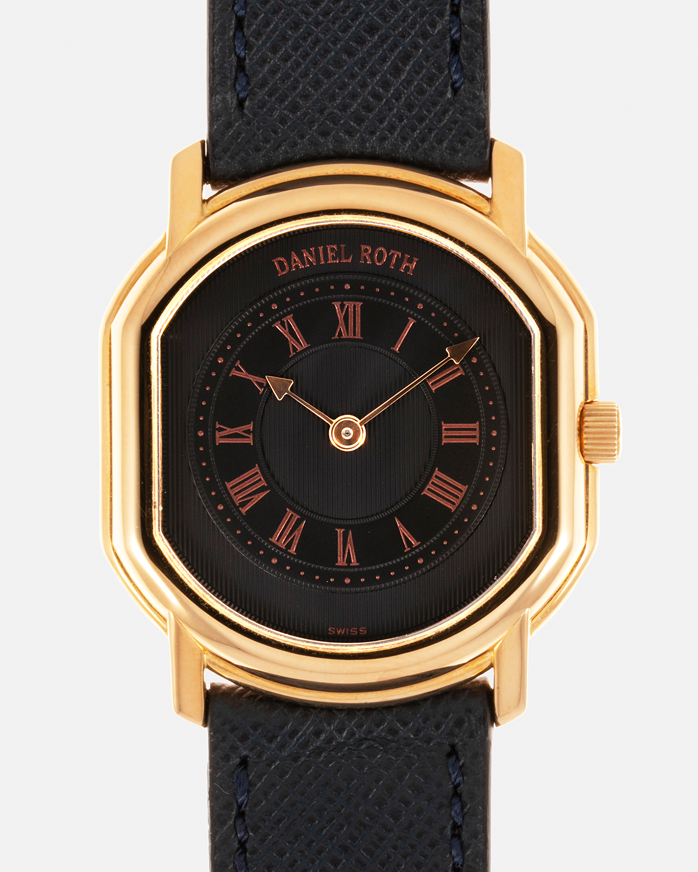 Brand: Daniel Roth Year: Early 1990s Model: Midi Plat Black Dial Reference Number: 2167 Material: 18-carat Yellow Gold  Movement: Daniel Roth Cal. 196, Manual-Winding Case Diameter: 37mm x 32mm Lug Width: 18mm Strap: Molequin Navy Textured Calf Leather Strap with Signed 18-carat Yellow Gold Tang Buckle