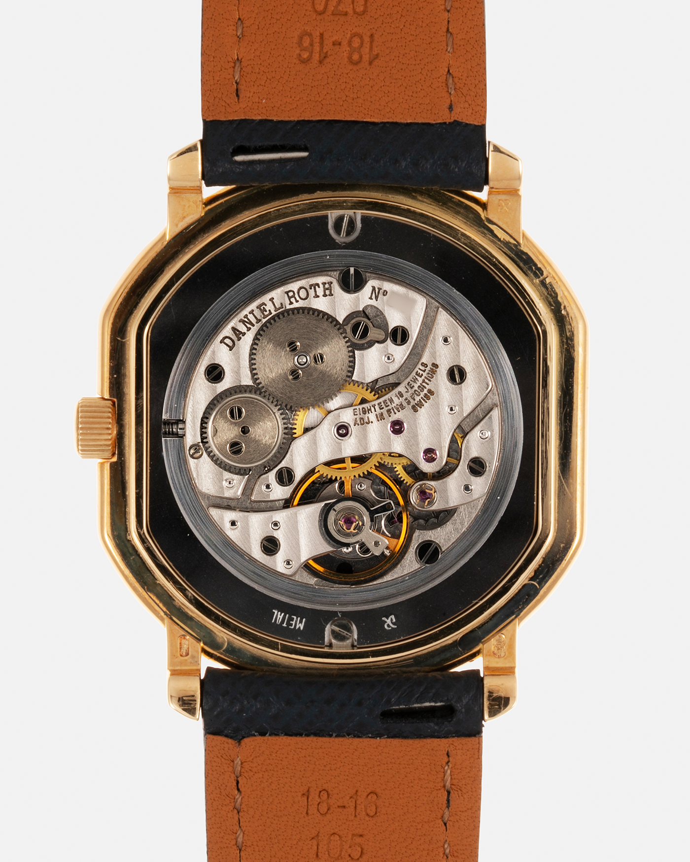 Brand: Daniel Roth Year: Early 1990s Model: Midi Plat Black Dial Reference Number: 2167 Material: 18-carat Yellow Gold  Movement: Daniel Roth Cal. 196, Manual-Winding Case Diameter: 37mm x 32mm Lug Width: 18mm Strap: Molequin Navy Textured Calf Leather Strap with Signed 18-carat Yellow Gold Tang Buckle