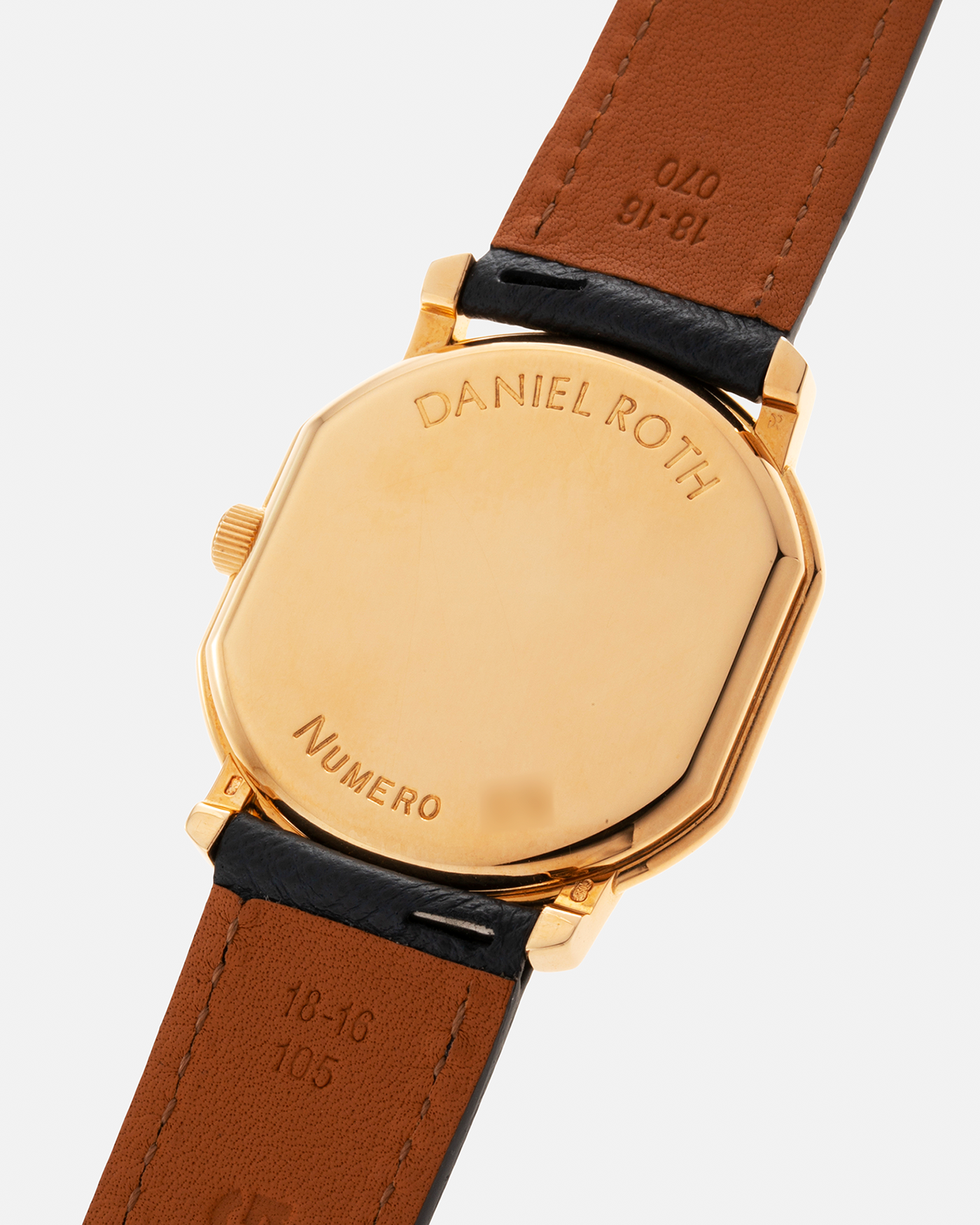 Brand: Daniel Roth Year: Early 1990s Model: Midi Plat Black Dial Reference Number: 2167 Material: 18-carat Yellow Gold  Movement: Daniel Roth Cal. 196, Manual-Winding Case Diameter: 37mm x 32mm Lug Width: 18mm Strap: Molequin Navy Textured Calf Leather Strap with Signed 18-carat Yellow Gold Tang Buckle
