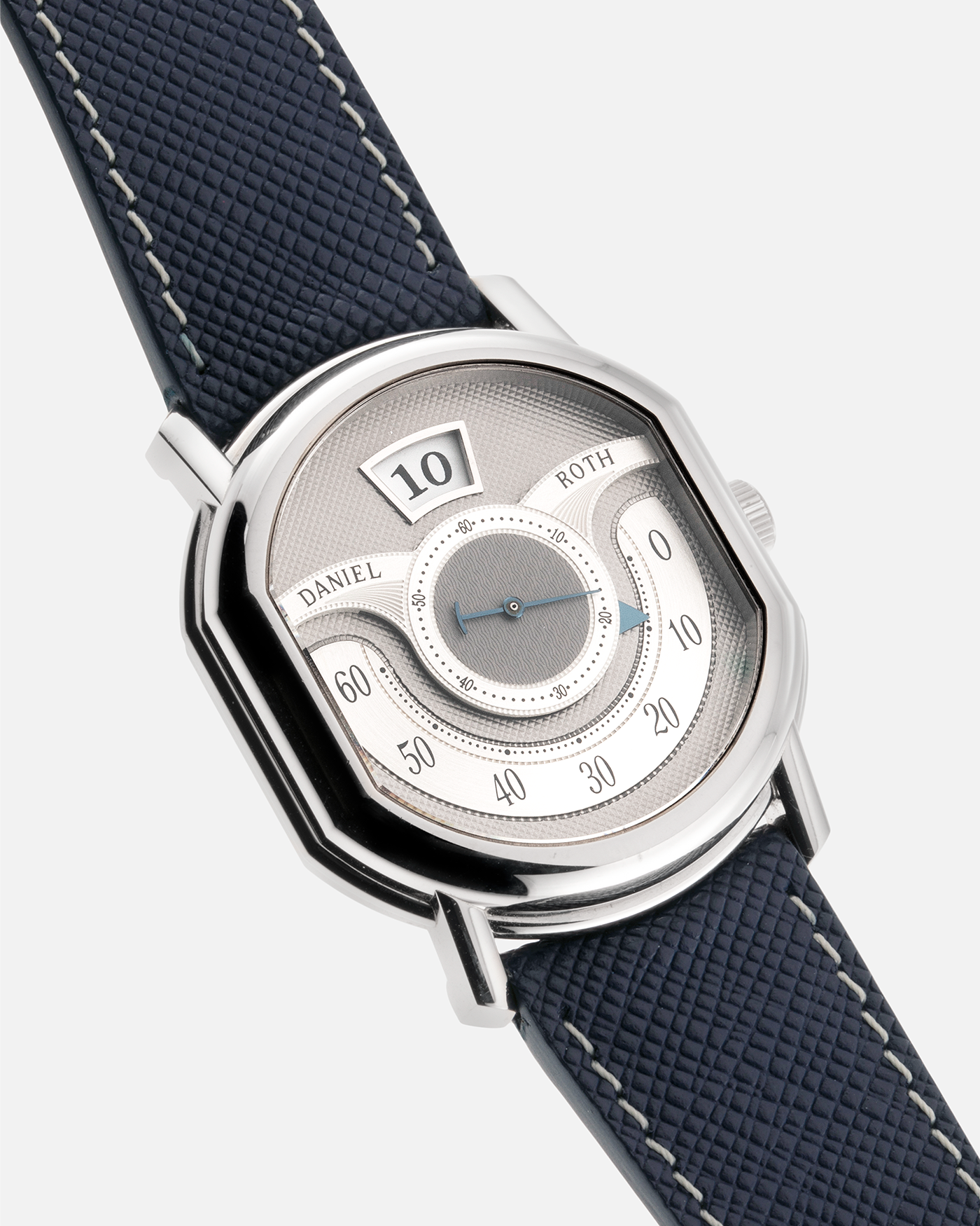 Brand: Daniel Roth Year: 1999 Model: 10th Anniversary Papillon, Limited Edition (White Gold in 110 pieces) Material: 18-carat White Gold Movement: Daniel Roth Cal. DR113, Self-Winding Case Diameter: 35mm x 41mm x 11mm Bracelet/Strap: Navy Blue Saffiano Leather Strap with Signed 18-carat White Gold Tang Buckle