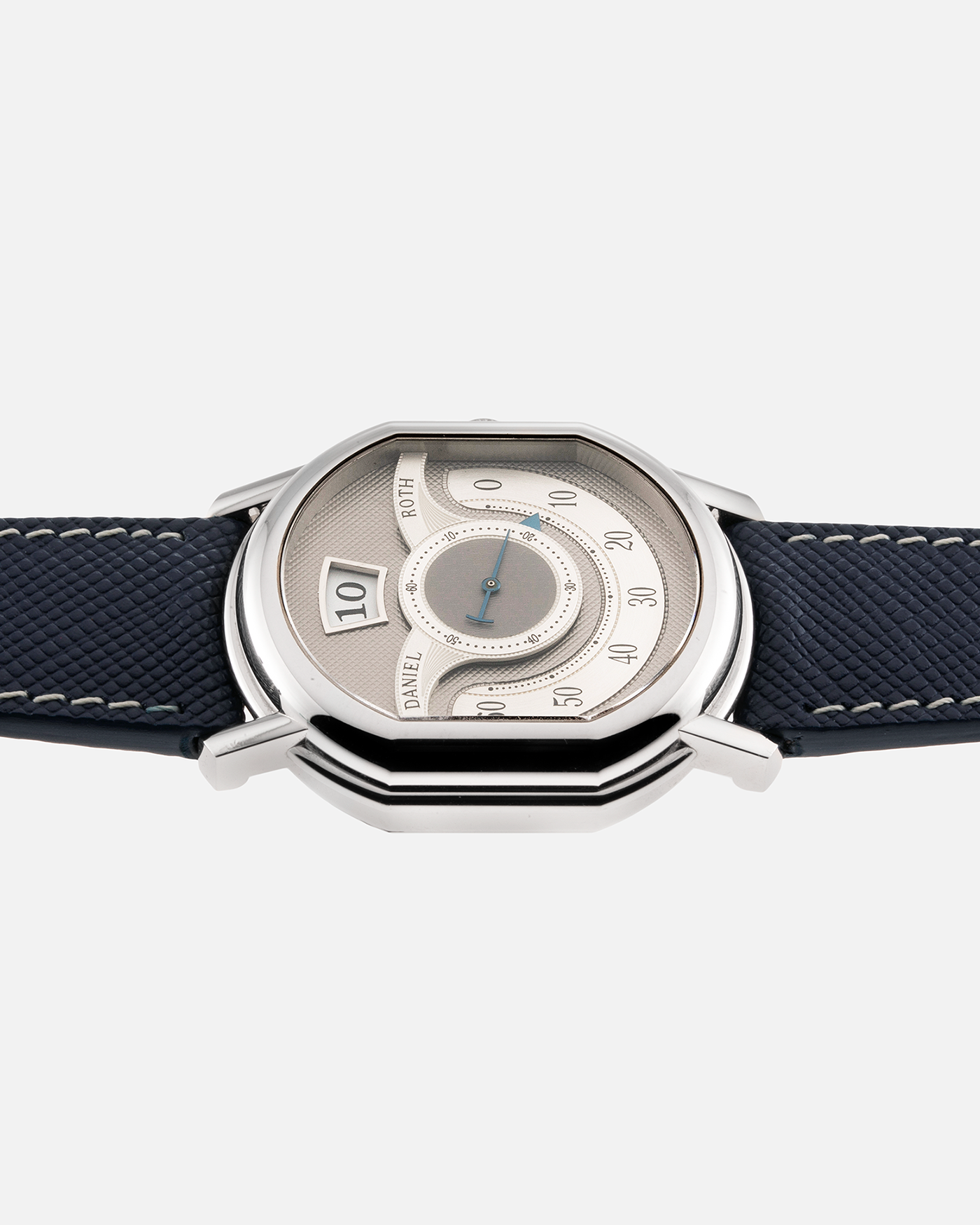 Brand: Daniel Roth Year: 1999 Model: 10th Anniversary Papillon, Limited Edition (White Gold in 110 pieces) Material: 18-carat White Gold Movement: Daniel Roth Cal. DR113, Self-Winding Case Diameter: 35mm x 41mm x 11mm Bracelet/Strap: Navy Blue Saffiano Leather Strap with Signed 18-carat White Gold Tang Buckle