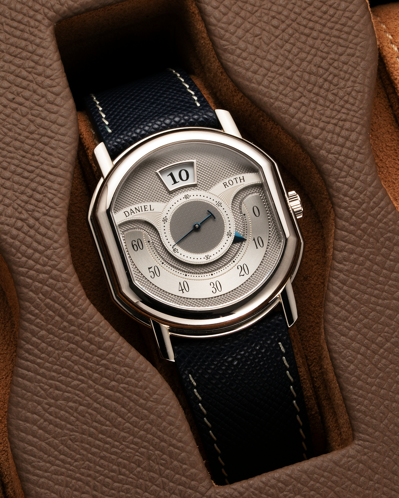 Brand: Daniel Roth Year: 1999 Model: 10th Anniversary Papillon, Limited Edition (White Gold in 110 pieces) Material: 18-carat White Gold Movement: Daniel Roth Cal. DR113, Self-Winding Case Diameter: 35mm x 41mm x 11mm Bracelet/Strap: Navy Blue Saffiano Leather Strap with Signed 18-carat White Gold Tang Buckle