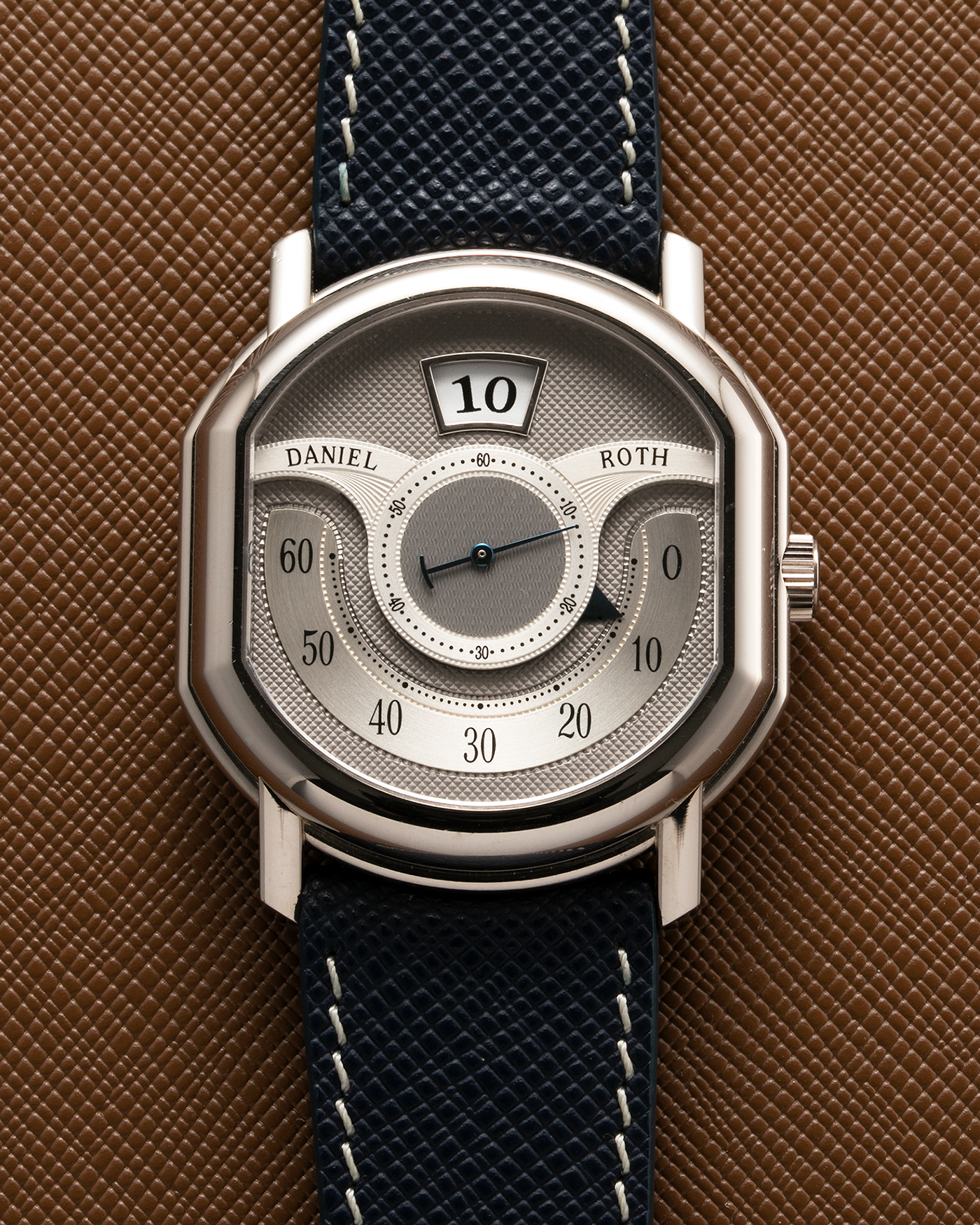 Brand: Daniel Roth Year: 1999 Model: 10th Anniversary Papillon, Limited Edition (White Gold in 110 pieces) Material: 18-carat White Gold Movement: Daniel Roth Cal. DR113, Self-Winding Case Diameter: 35mm x 41mm x 11mm Bracelet/Strap: Navy Blue Saffiano Leather Strap with Signed 18-carat White Gold Tang Buckle