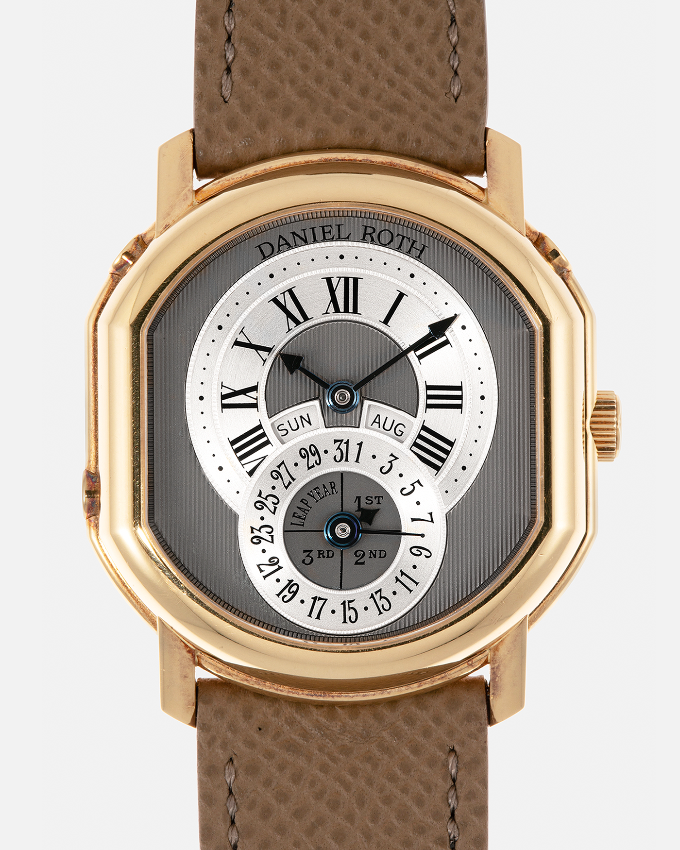 Brand: Daniel Roth
Year: Early 1990’s
Model: 2117 Perpetual Calendar (First Generation)
Material: 18-carat Yellow Gold
Movement: Daniel Roth Cal. DR117 (Based on Lemania Cal. 8810), Self-Winding
Case Dimensions: 35mm x 38mm (Lug-to-Lug 41mm)
Lug Width: 20mm
Strap: Nostime Taupe Brown Textured Calf Leather Strap with Signed 18-carat Yellow Gold Tang Buckle