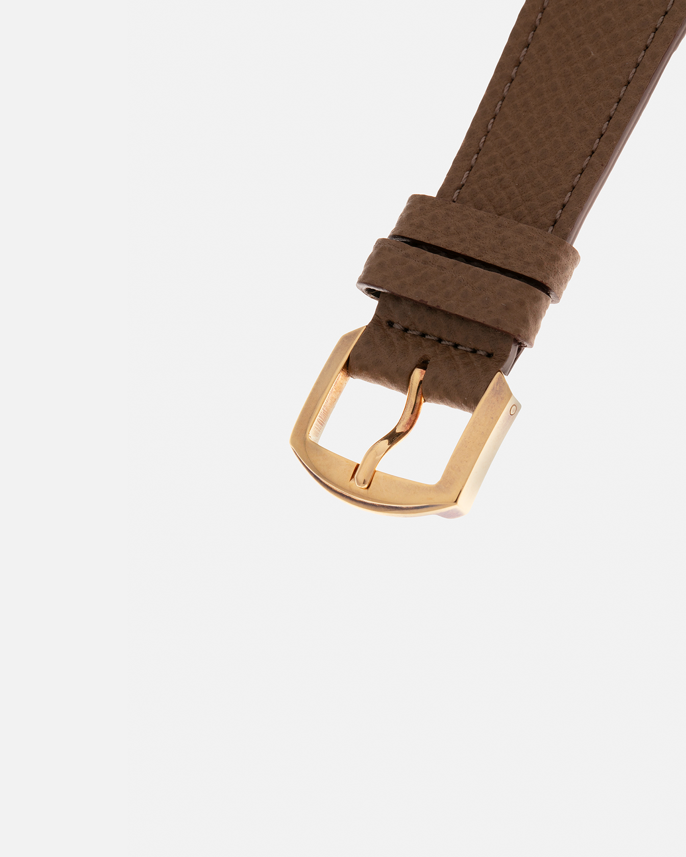 Brand: Daniel Roth
Year: Early 1990’s
Model: 2117 Perpetual Calendar (First Generation)
Material: 18-carat Yellow Gold
Movement: Daniel Roth Cal. DR117 (Based on Lemania Cal. 8810), Self-Winding
Case Dimensions: 35mm x 38mm (Lug-to-Lug 41mm)
Lug Width: 20mm
Strap: Nostime Taupe Brown Textured Calf Leather Strap with Signed 18-carat Yellow Gold Tang Buckle