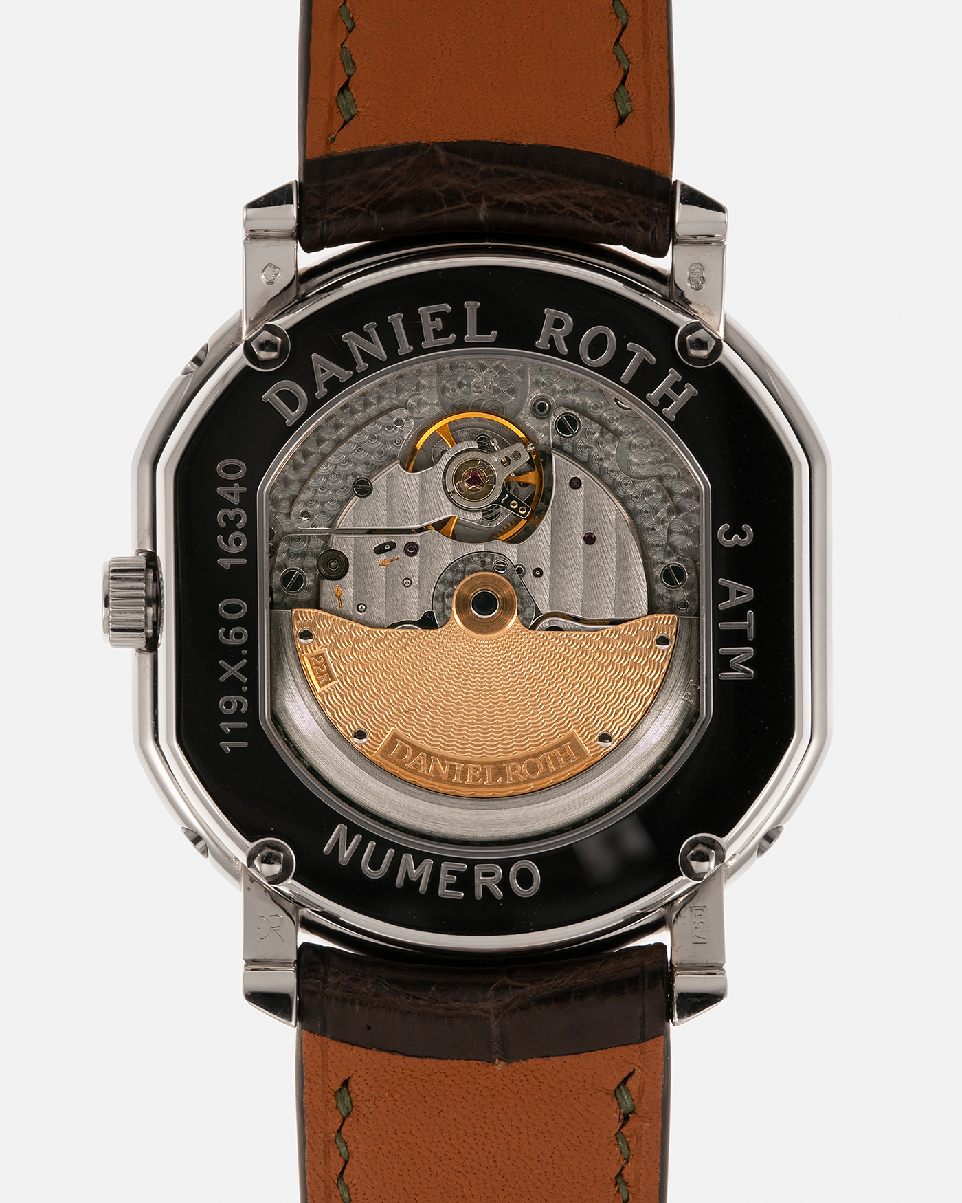 Brand: Daniel Roth
Year: 1990’s
Model: Perpetual Calendar Skeleton
Reference: 119.X.60
Material: 18-carat White Gold
Movement: Daniel Roth Cal. DR114 (Based on Girard-Perregaux GP3000), Self-Winding
Case Dimensions: 41mm (Including Lugs) x 38mm x 9.8mm
Lug Width: 20mm
Straps: Custom Dark Brown Alligator Leather Strap with Signed 18-carat White Gold Tang Buckle, with extra Daniel Roth Black Alligator Leather Strap