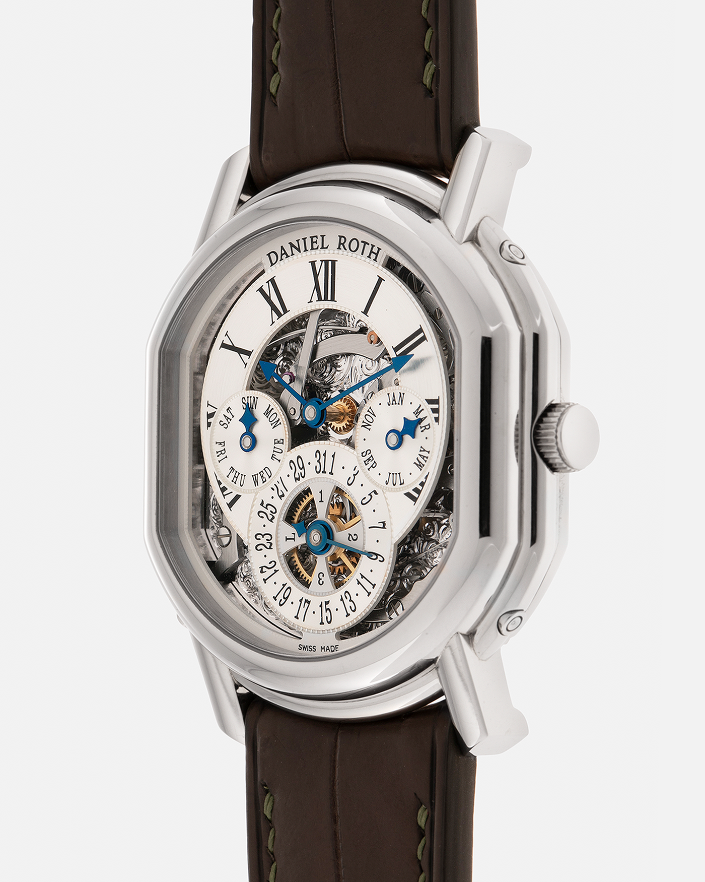 Brand: Daniel Roth Year: 1990’s Model: Perpetual Calendar Skeleton Reference: 119.X.60  Material: 18-carat White Gold Movement: Daniel Roth Cal. DR114 (Based on Girard-Perregaux GP3000), Self-Winding Case Dimensions: 41mm (Including Lugs) x 38mm x 9.8mm Lug Width: 20mm Straps: Custom Dark Brown Alligator Leather Strap with Signed 18-carat White Gold Tang Buckle, with extra Daniel Roth Black Alligator Leather Strap 